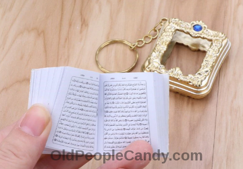 A Holy Koran key chain and book case