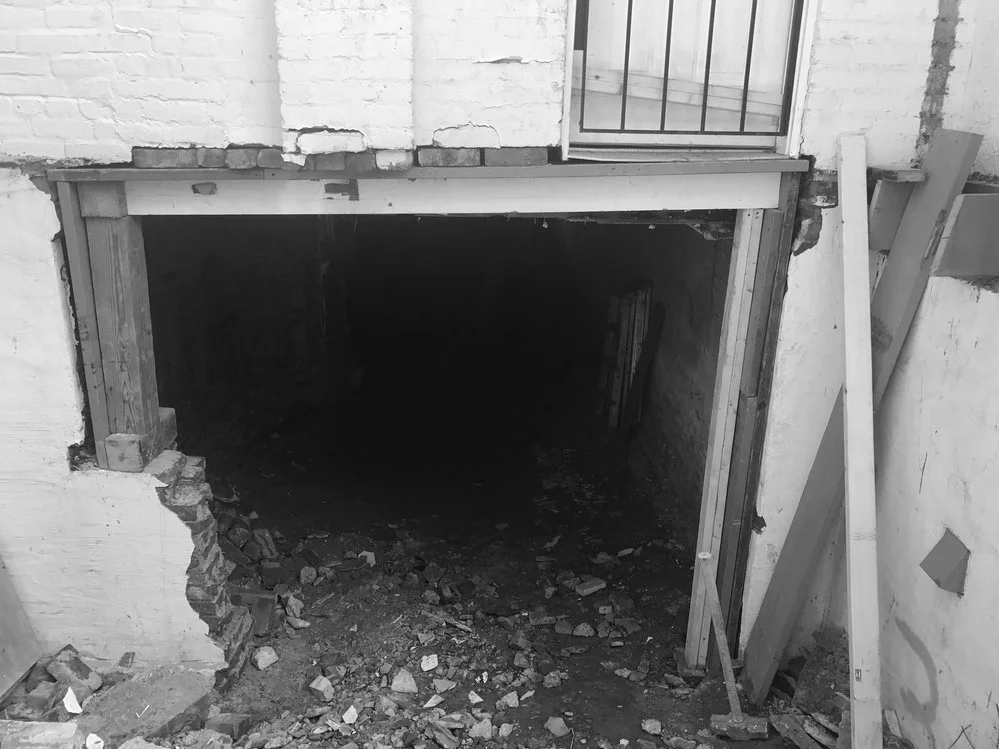 05_Demoliton%2BHole%2BBasement%2BUnits%2BBW.jpg