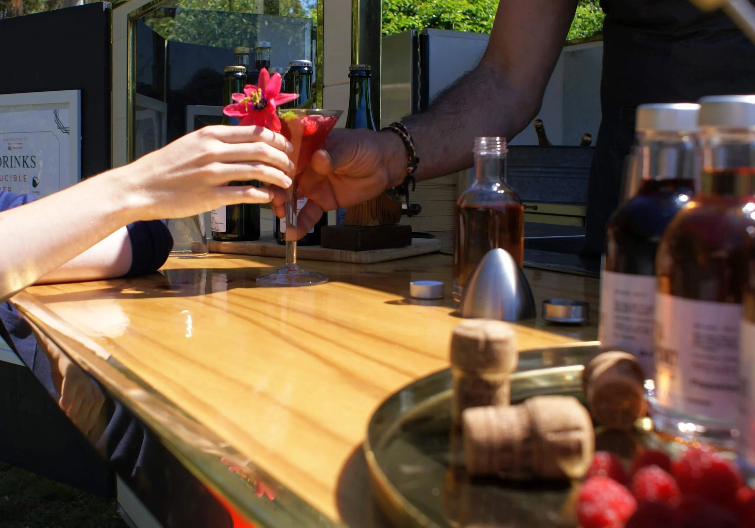 Handing_over_the_cocktail.jpg