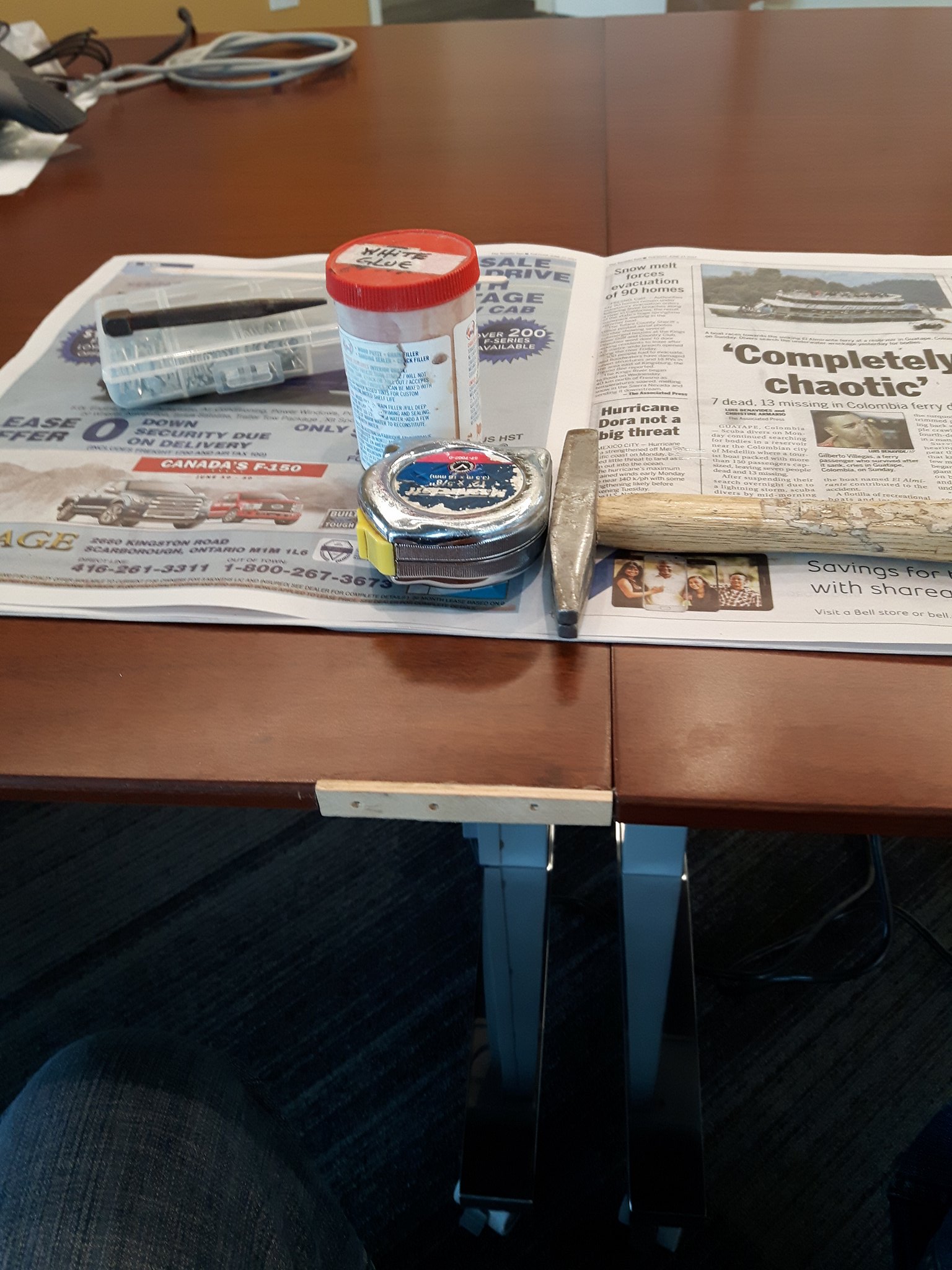 TUP BOARDROOM TABLE REPAIR TO REPLACE LARGE WOOD CHUNK MISSING FROM TABLE EDGE BEFORE.jpg