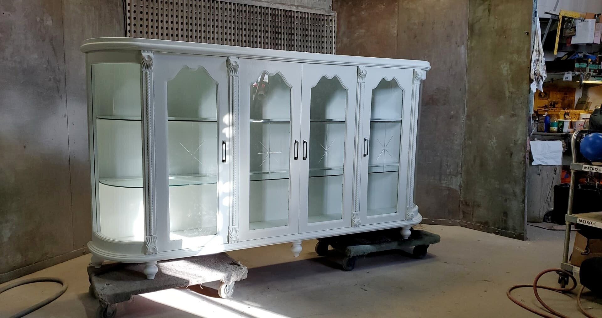 AFTER - HUTCH .... Buffet/Hutch Unit we made hutch in to a freestanding bookcase with new feet and painted 