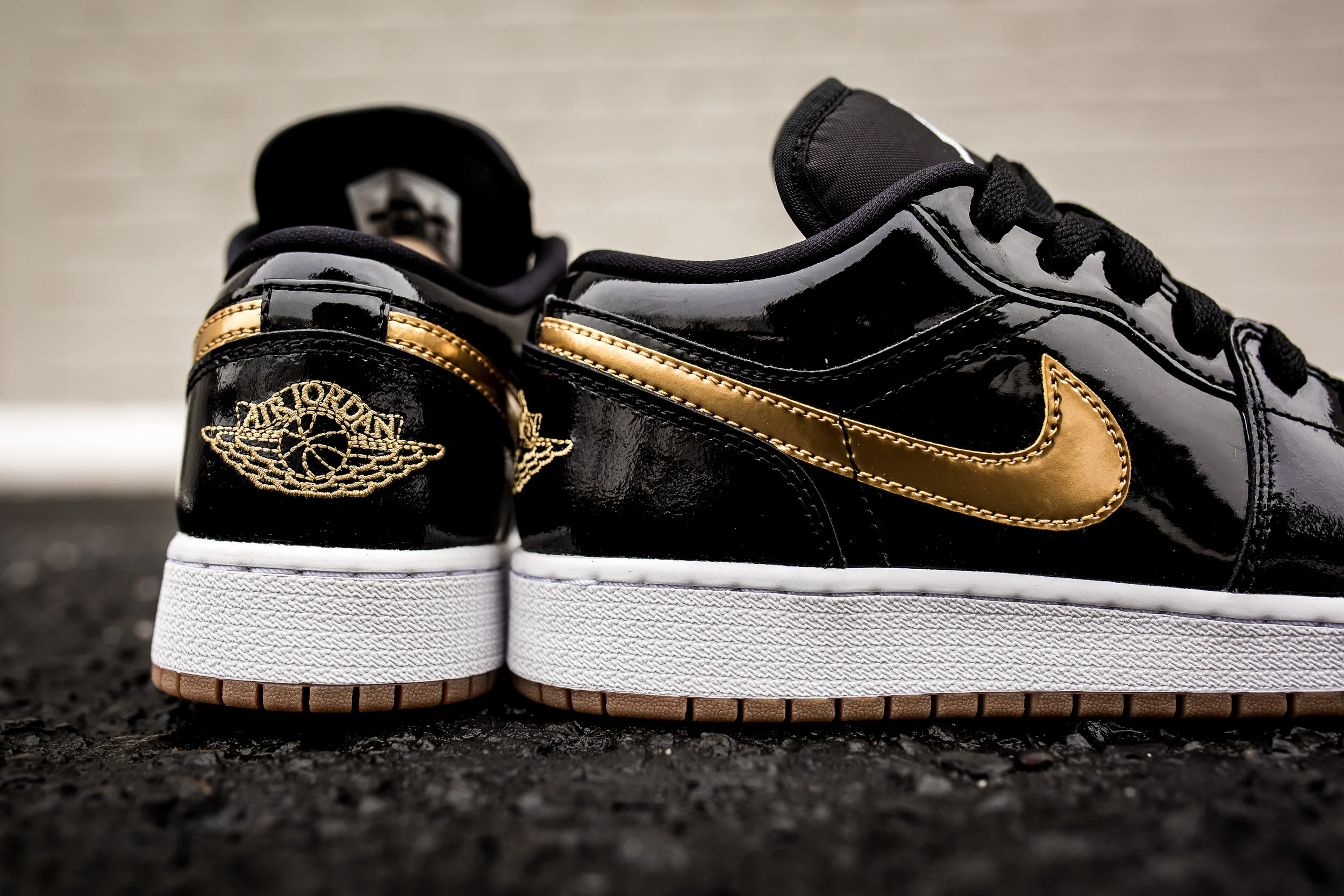 GRADE SCHOOL AIR JORDAN 1 RETRO LOW PATENT LEATHER 'BLACK/GOLD' FOR $69.99
