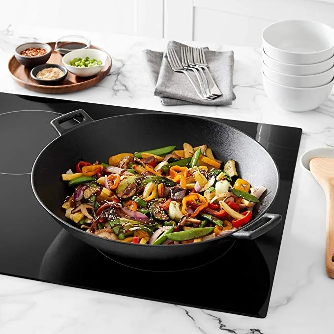 AMAZON BASICS PRE-SEASONED CAST IRON WOK PAN FOR $26.61