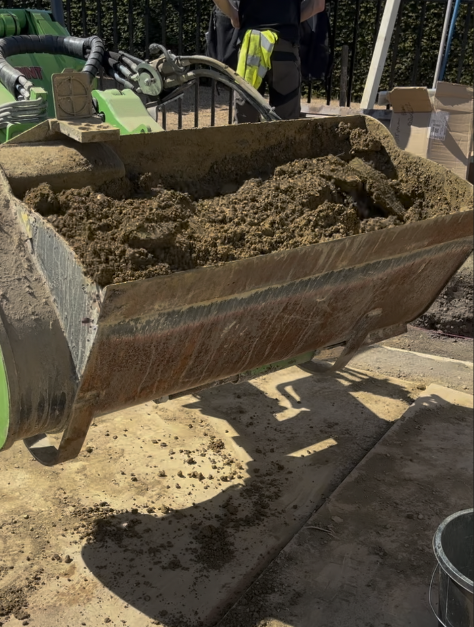 Rammed earth materials being mixed