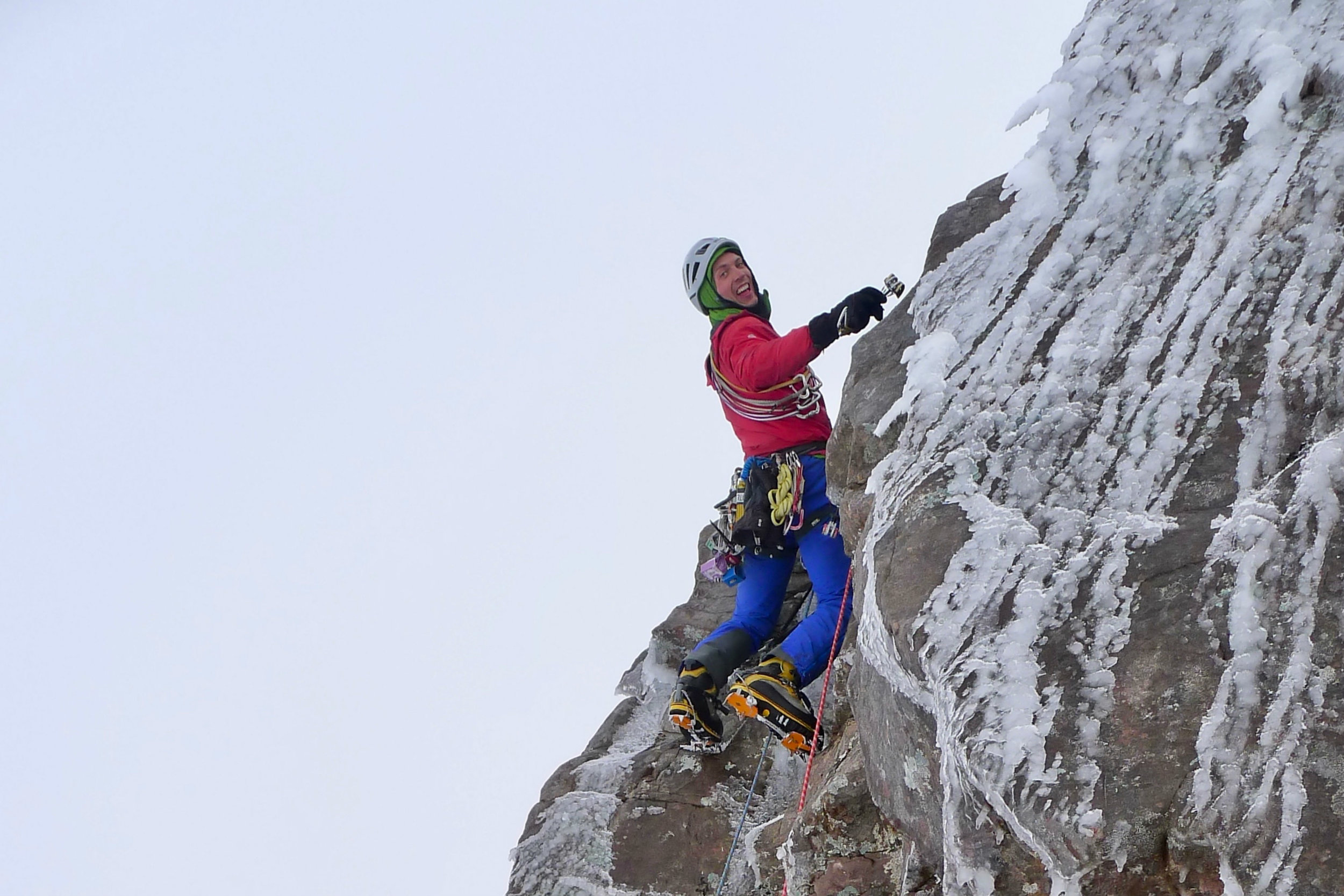 John having a great time climbing Torridon sandstone Scotland (1).jpg