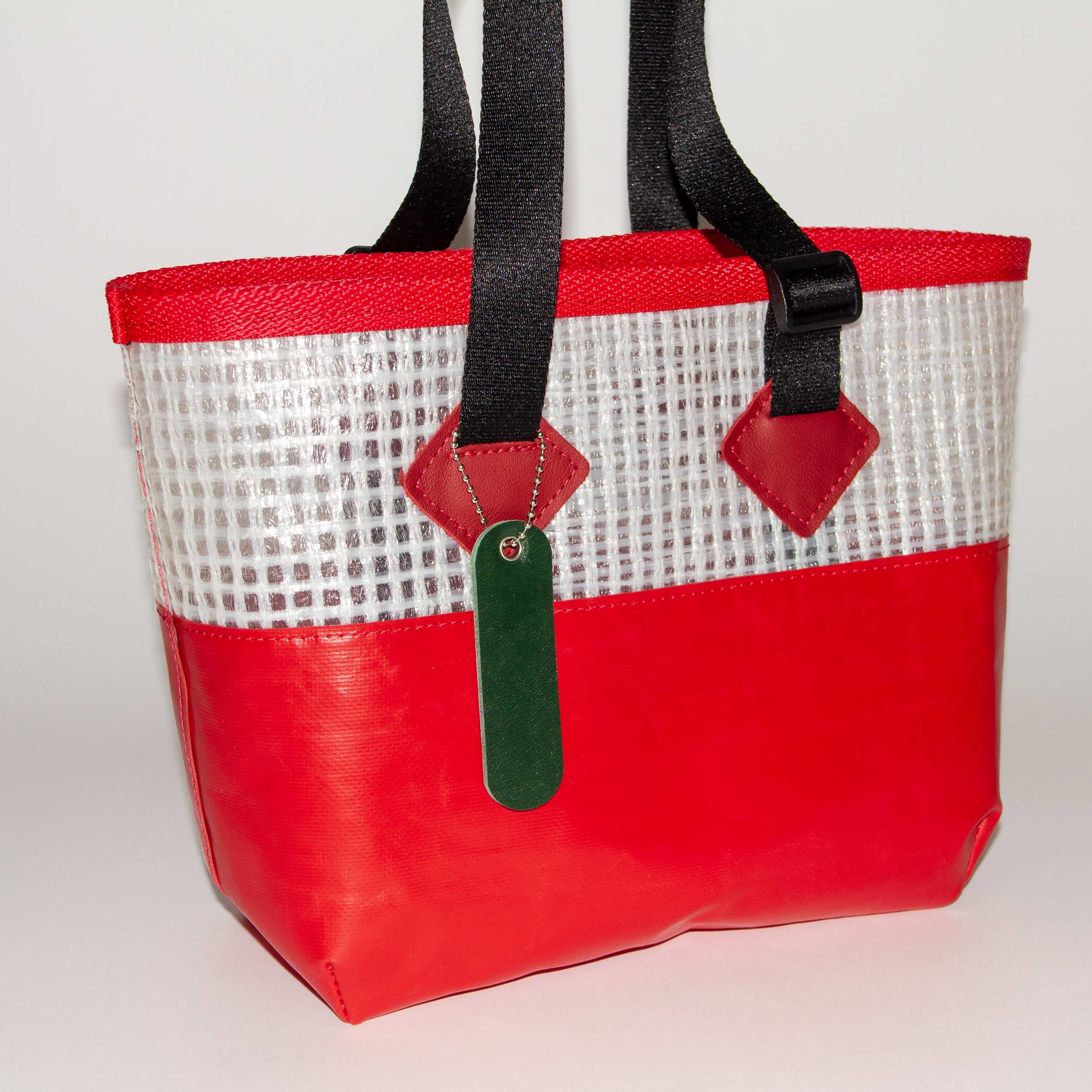 POWCH_Bag-Tag_Emerald_in-use.jpg (Copy)