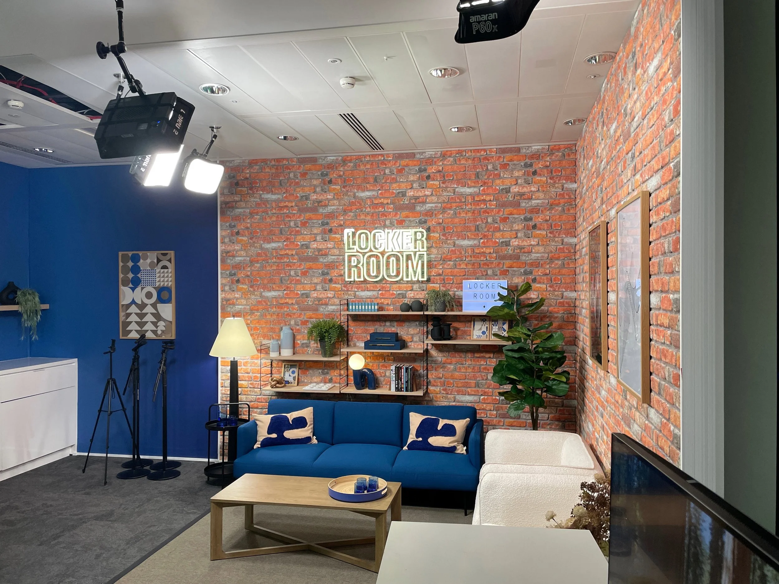  Custom designed podcast studio set with sofas and lighting 