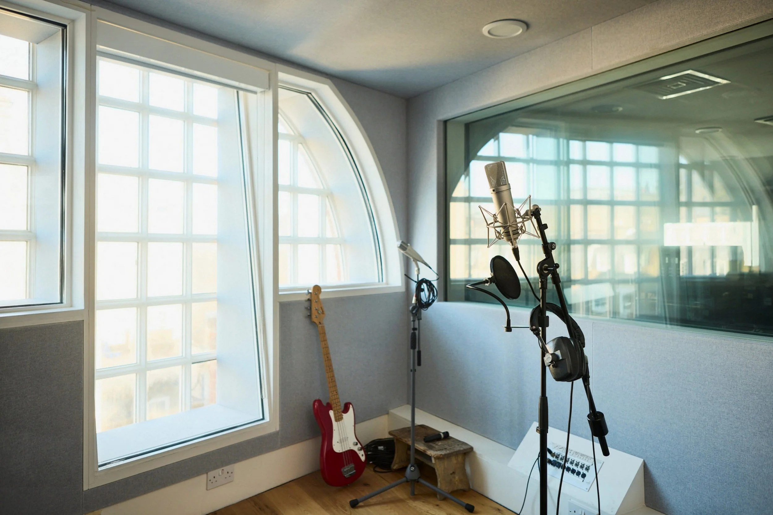  London recording studio live room with a window to the control room 