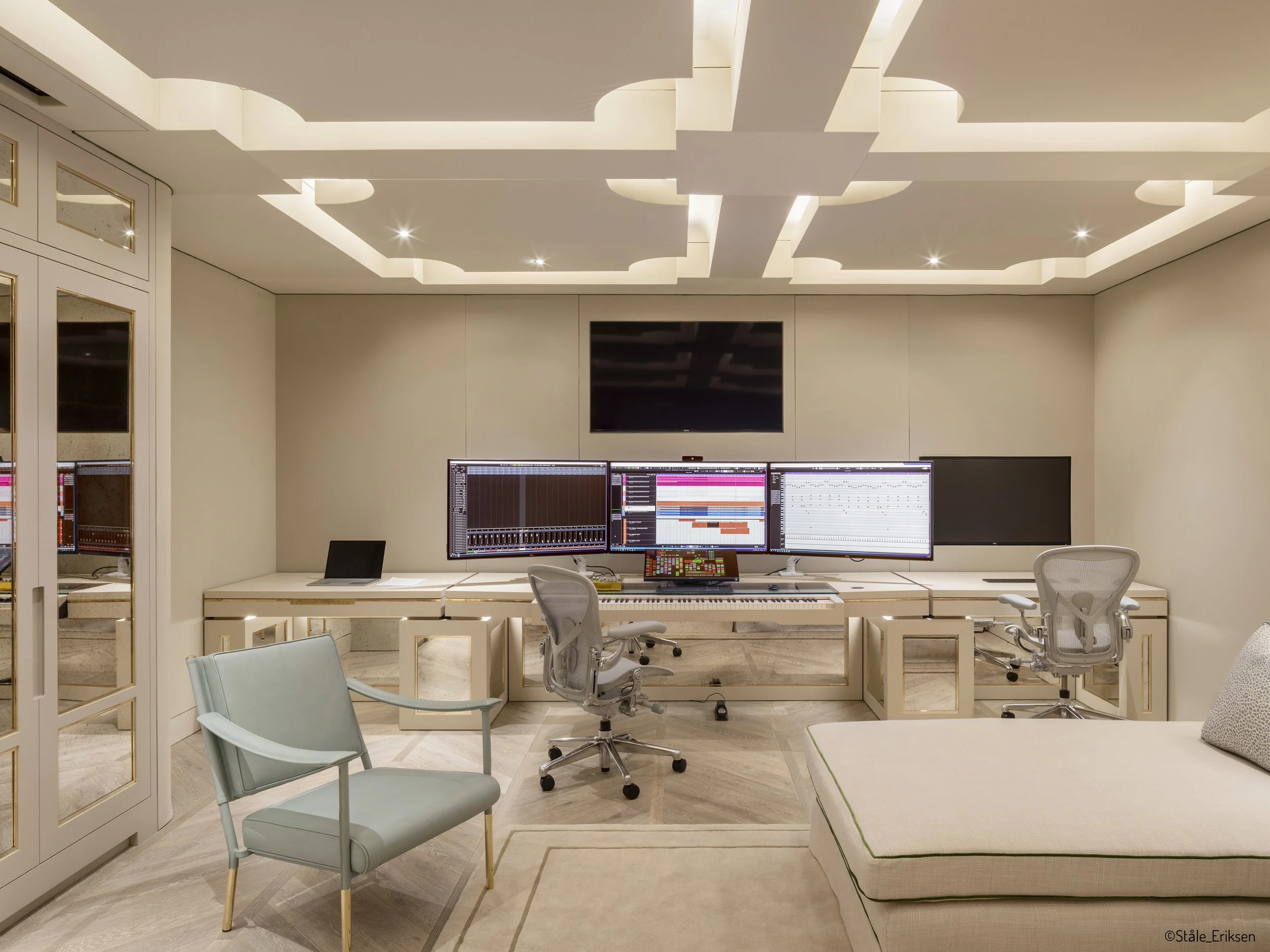  Film composer music studio with custom acoustic treatment, fabric wall interior and custom workstation furniture. 