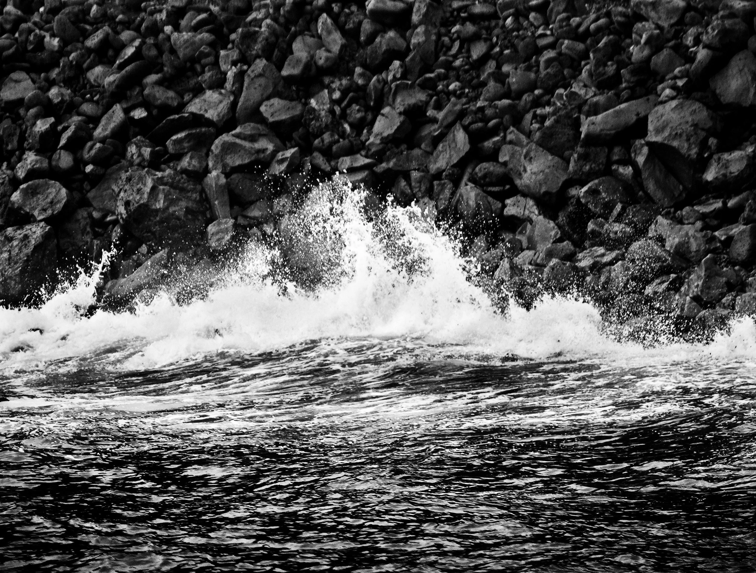 La Palma, Canary Islands. I’ve long been fascinated by what I call ‘interfaces’ - where the natural world meets the Man-made. The seawall here was not very attractive, but I saw potential in the shapes the breaking waves were making. I used a 70-200mm plus 1.7x TC to frame up this composition and to exclude the parked cars that were just out of frame at the top.