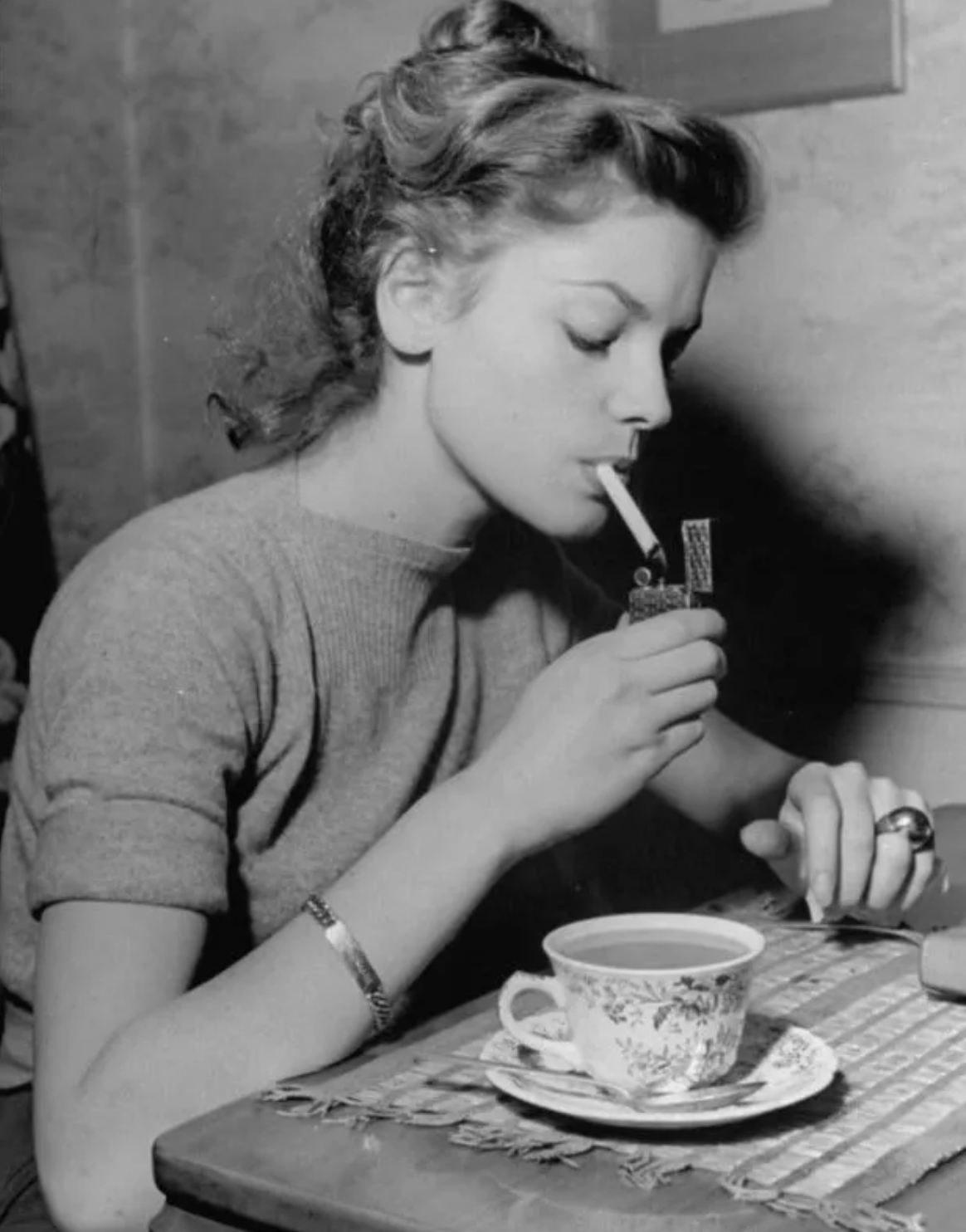 lauren bacall smoking a cigarette