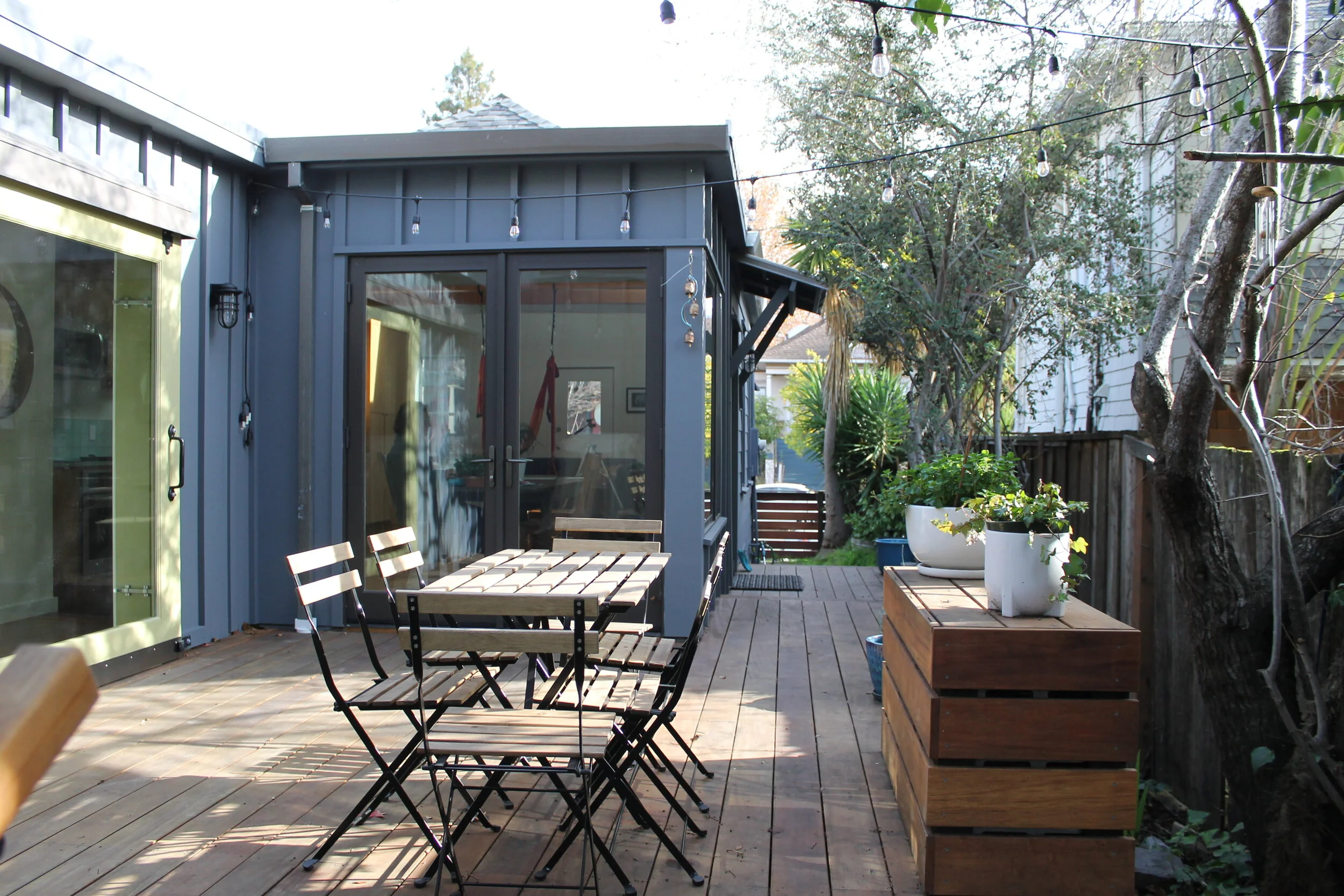  The outdoor “heart” of site is now this deck where cooking, dining, relaxation and homework take place. 