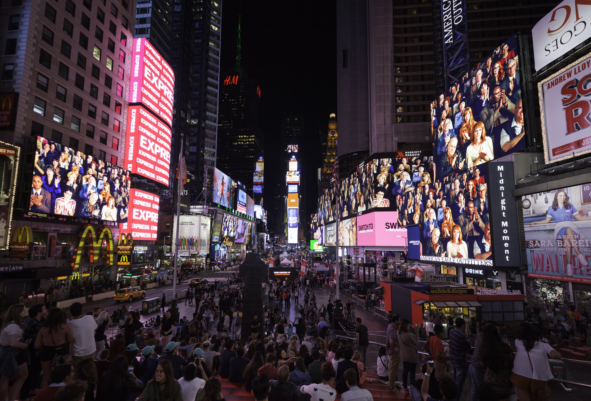   Applause , 2016. Times Square, Midnight Moment. June 1–30, 2017.   Photo by Ka-Man Tse for Times Square Arts 
