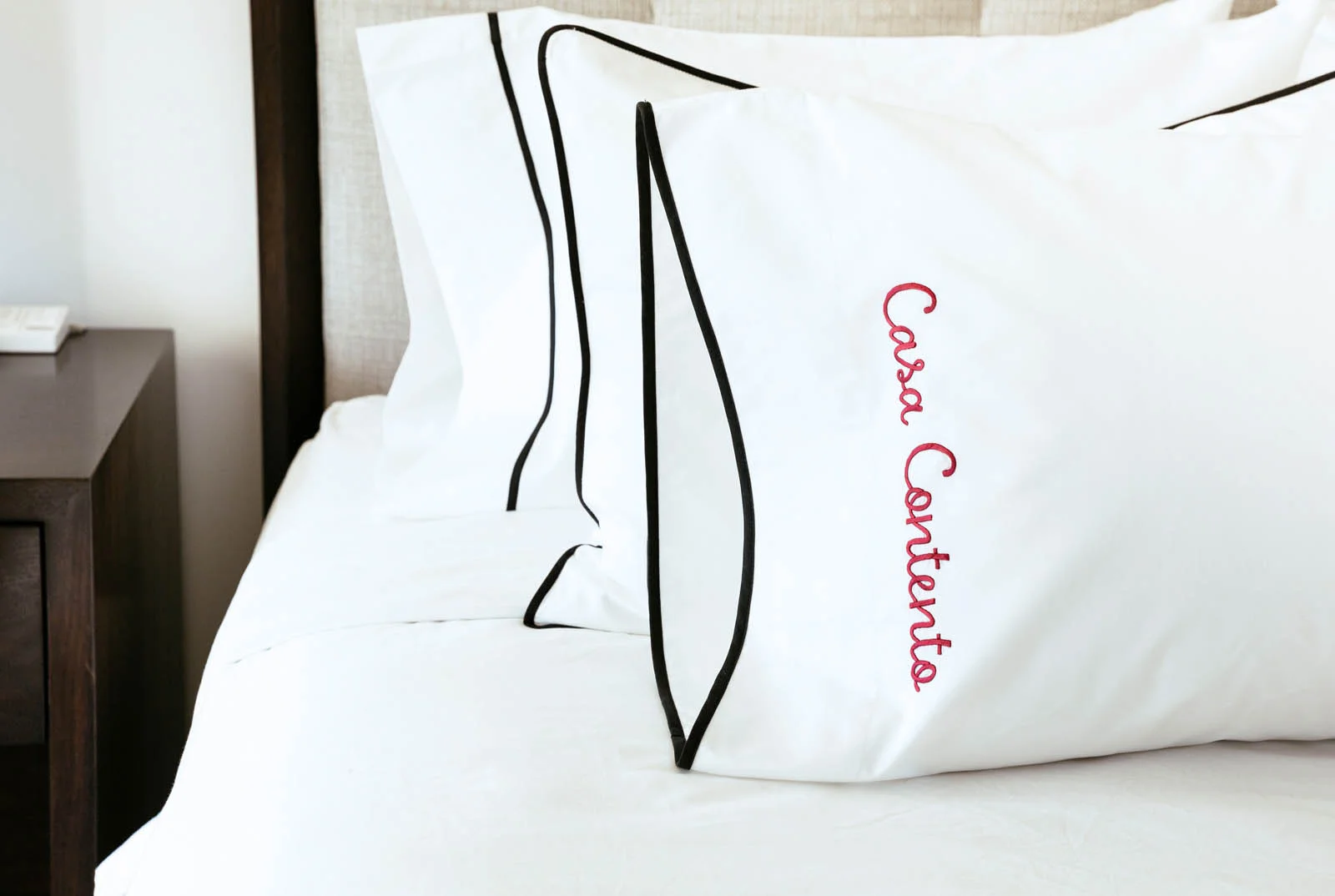 Pillowcase with binding and embroidered name in bold cursive