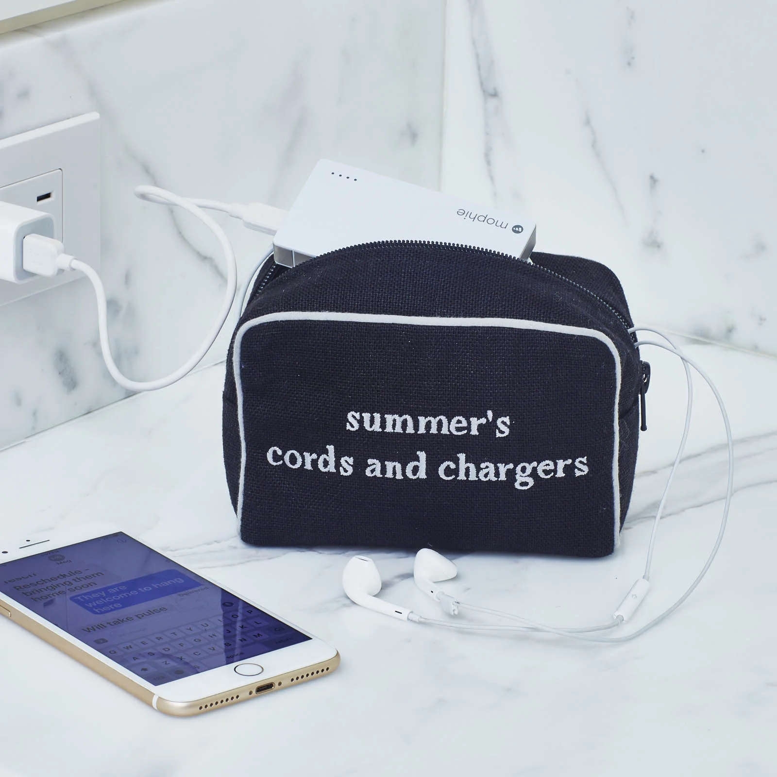 Small Milan in black textured linen in Lower Case Typewriter Font