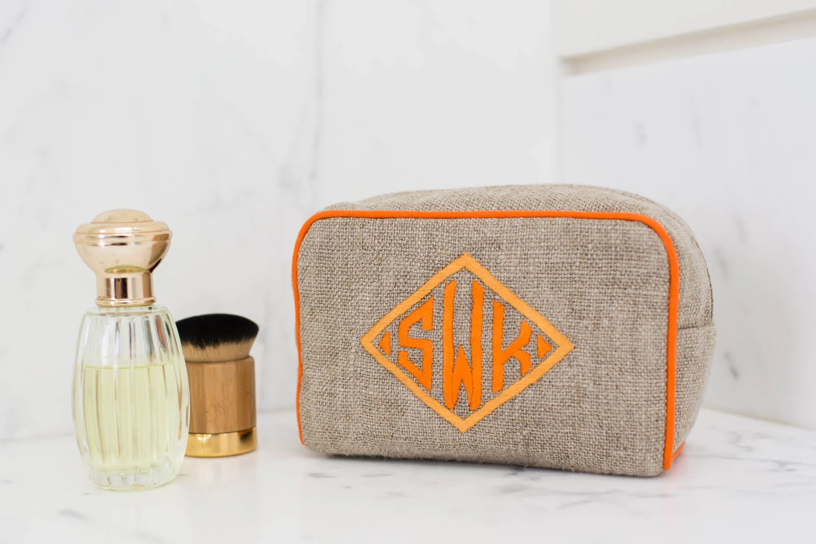 Small Milan in natural textured linen with Boxed diamond embroidery