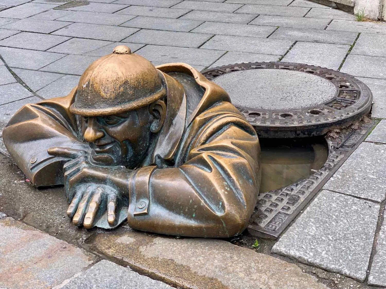 Tongue-in-cheek “Man at Work” statue