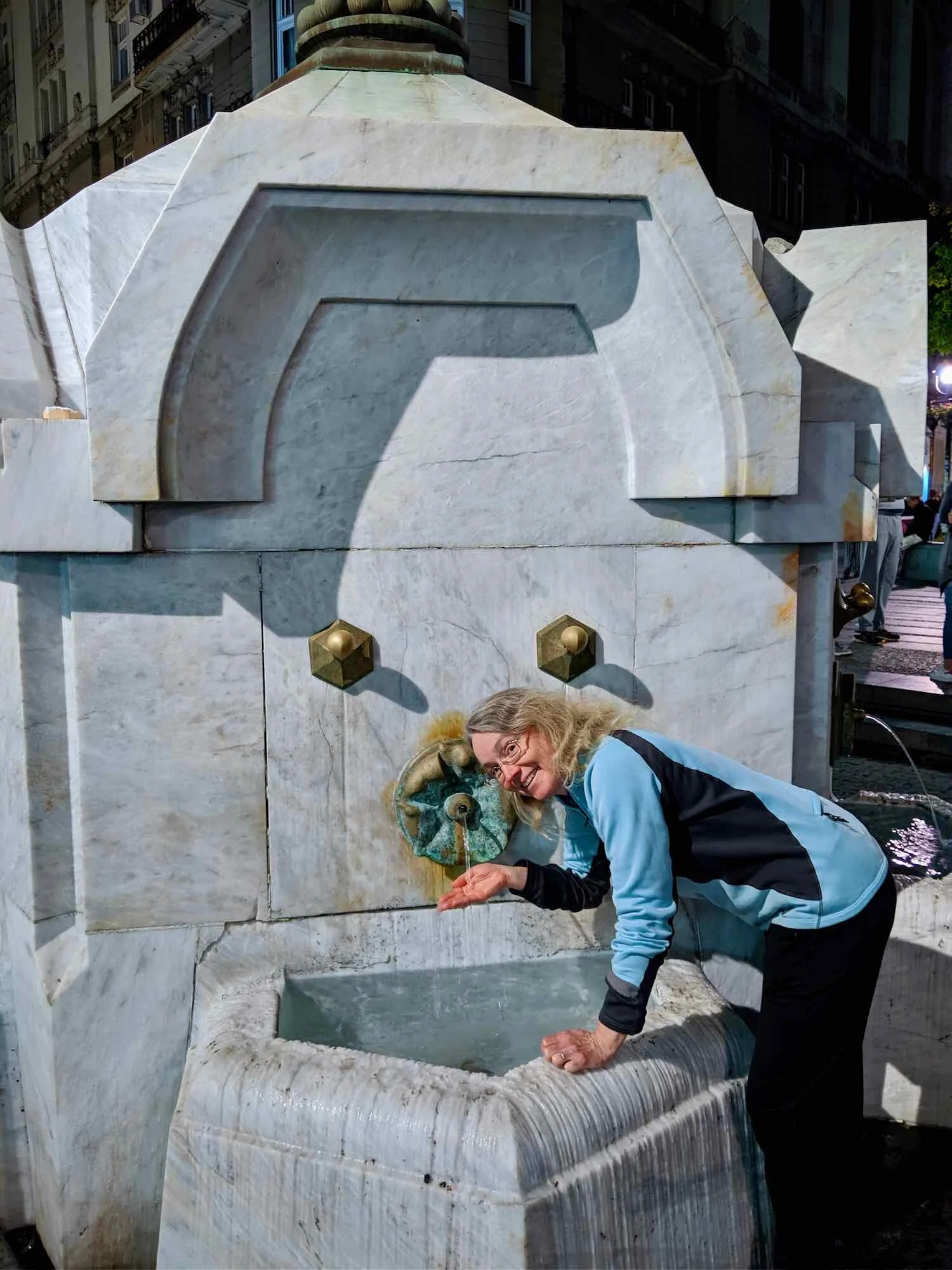 Checking out the public fountain