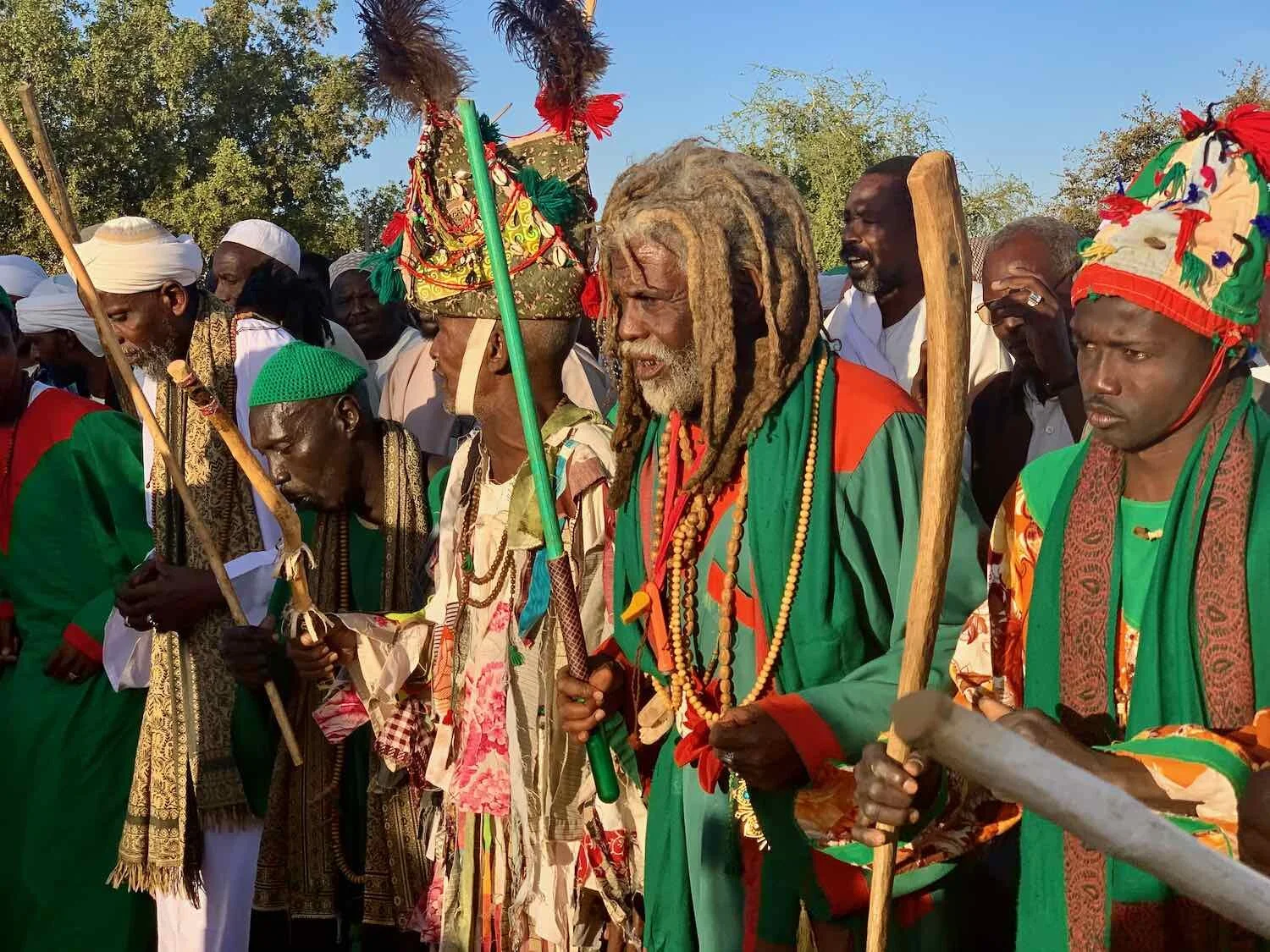 Sufi elders marching in a line