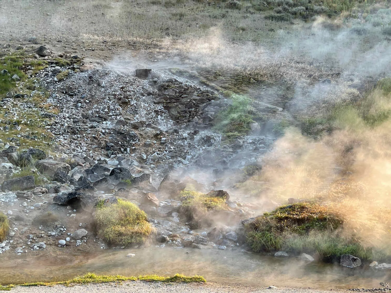 Billows of steam by the road