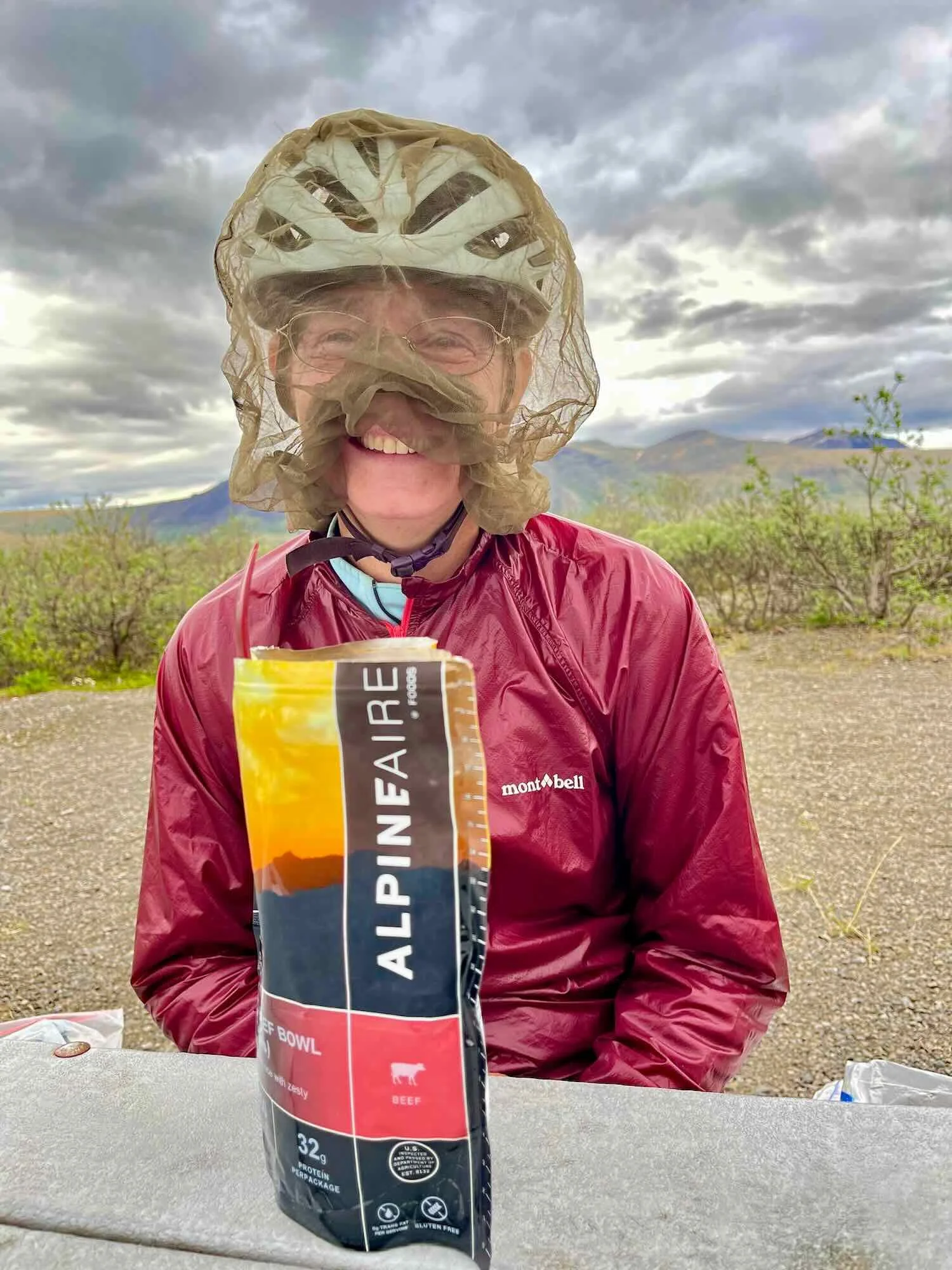 The art of eating with a mosquito head net