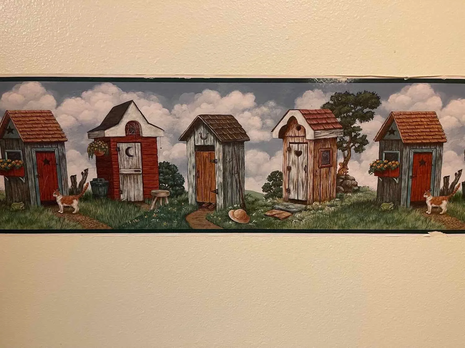 Wallpaper in a bathroom evokes bygone days