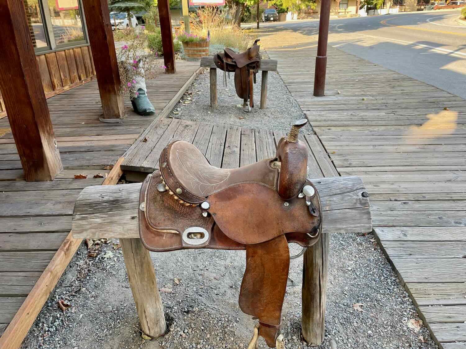 Saddles at the entrance to a shop in Winthrop, WA