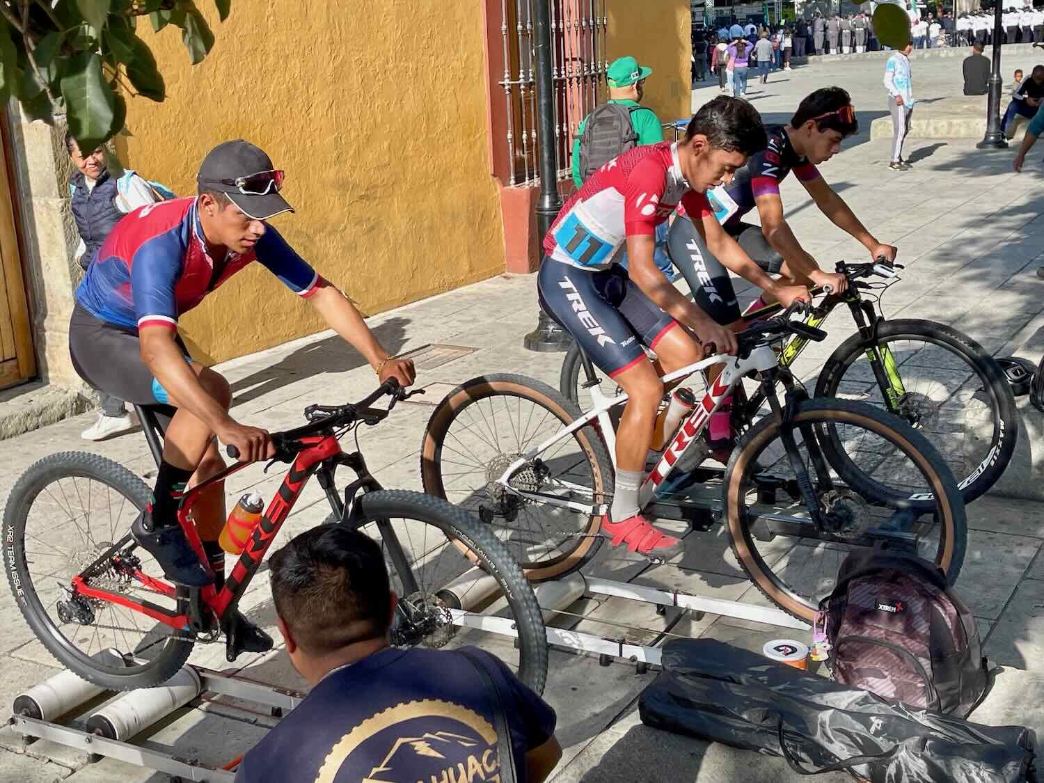 Warming up on rollers for the bicycle circuit race through the city's streets