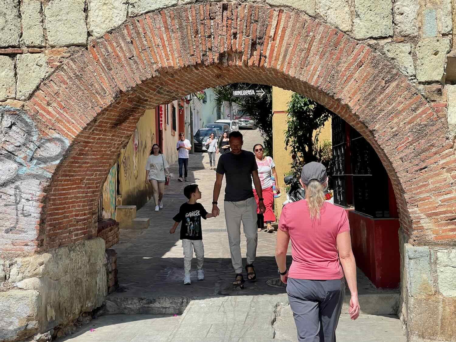 The arches of an aqueduct built in the mid-1700s now provide picturesque walkways