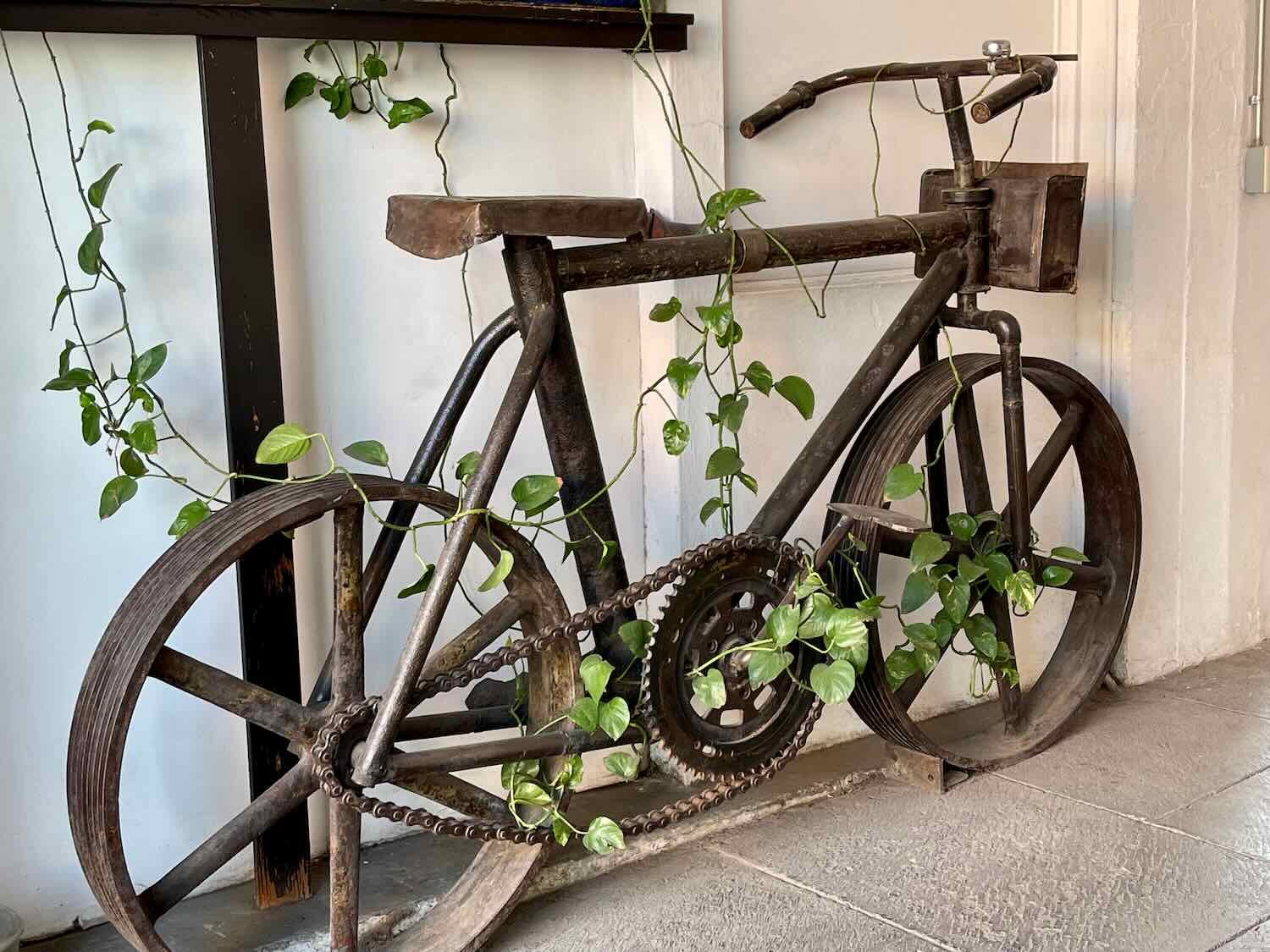 Bike art seen at the entrance to a cafe