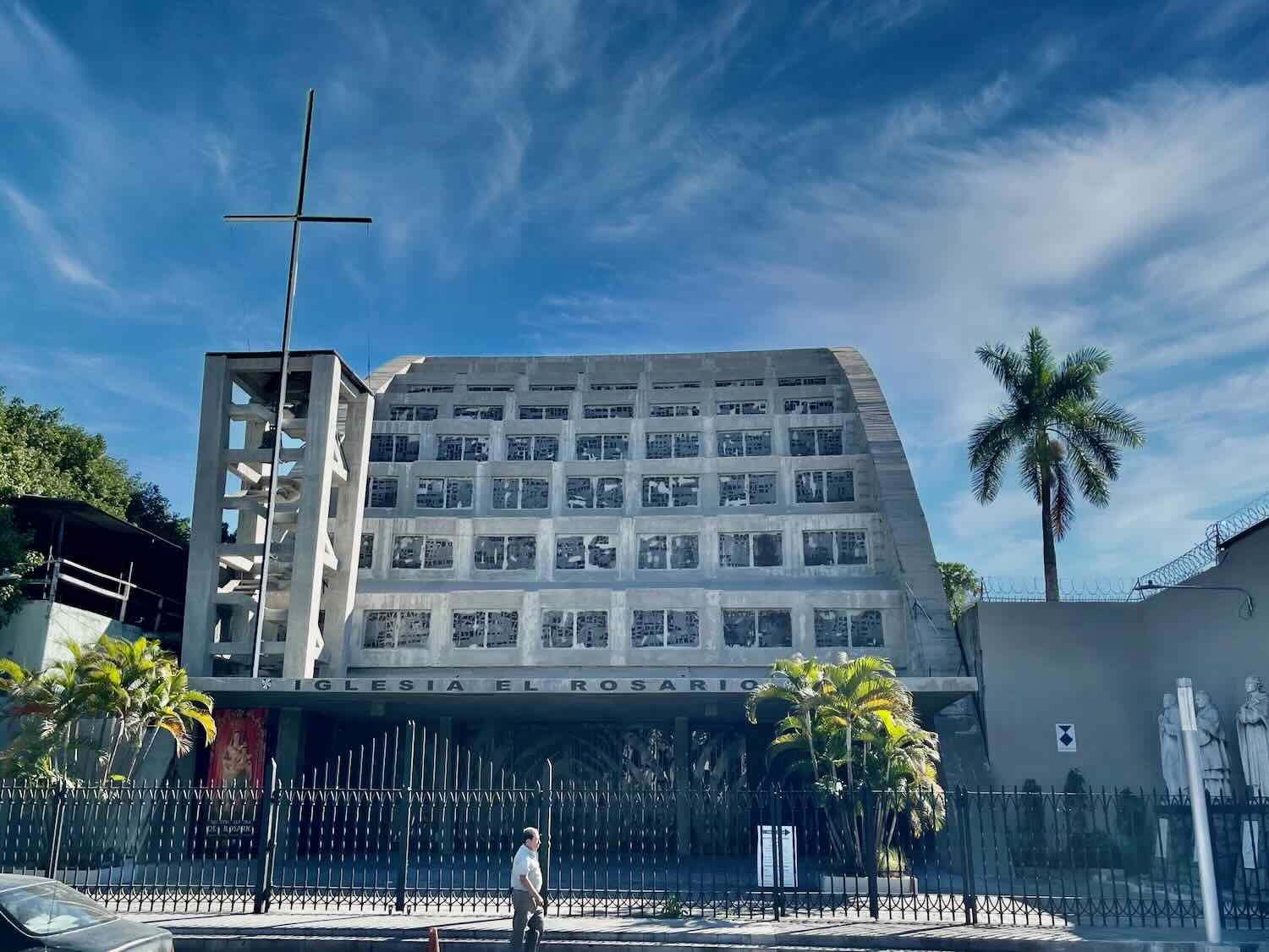 By comparison, the exterior of El Rosario Church seems rather plain, and is dominated by unpainted concrete