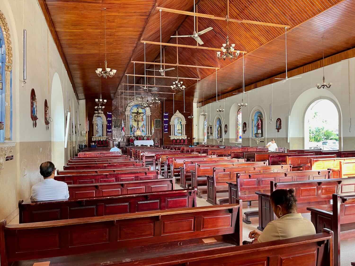 The simple interior of the cathedral had an impressive wooden ceiling and mahogany altar