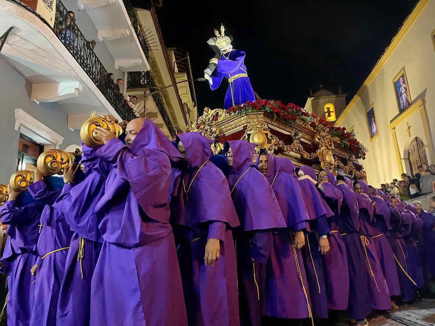 Porters dressed in purple carried a another ‘paso’ depicting Jesus bearing the cross