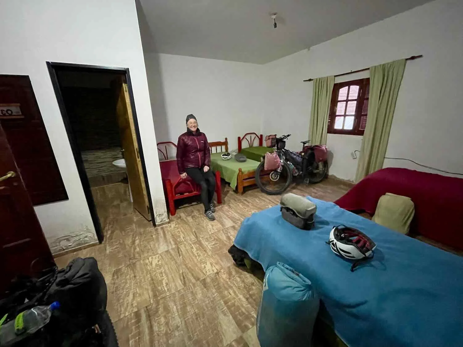 Our gigantic hotel room in El Eje. It had 6 beds (way more than we wanted), even though we were the only guests. Even with all the beds, there was still plenty of room to bring in the bicycles.