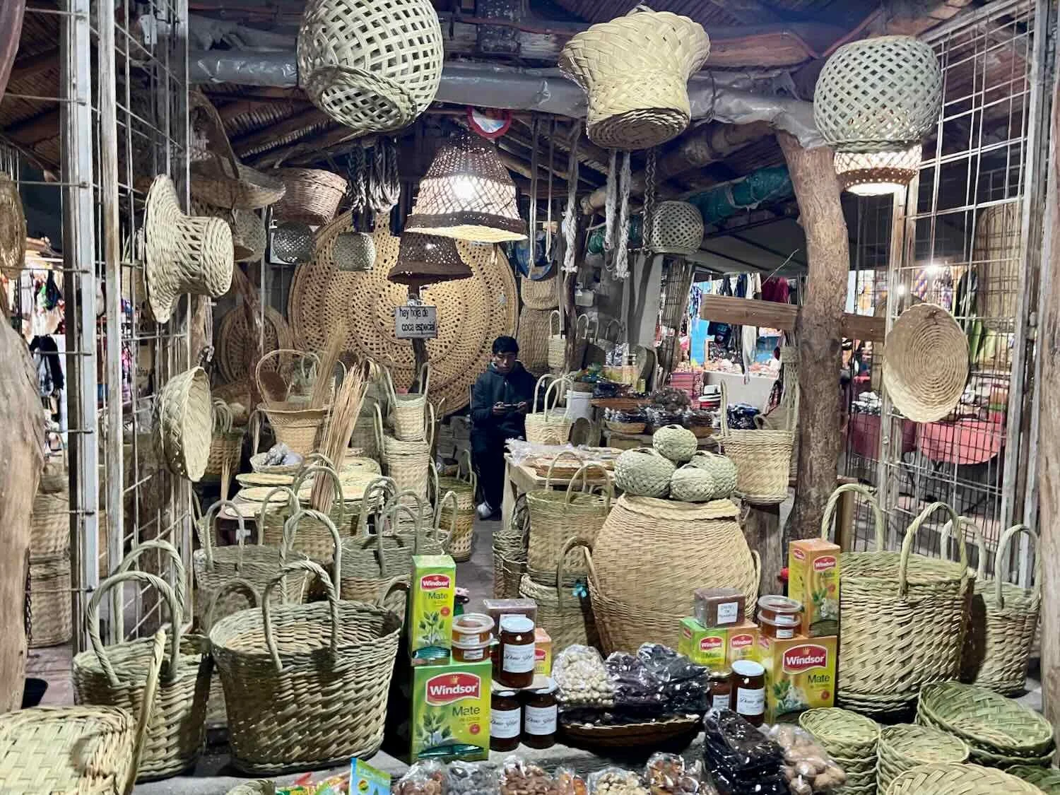 Traditionally woven baskets and hats for sale in the market