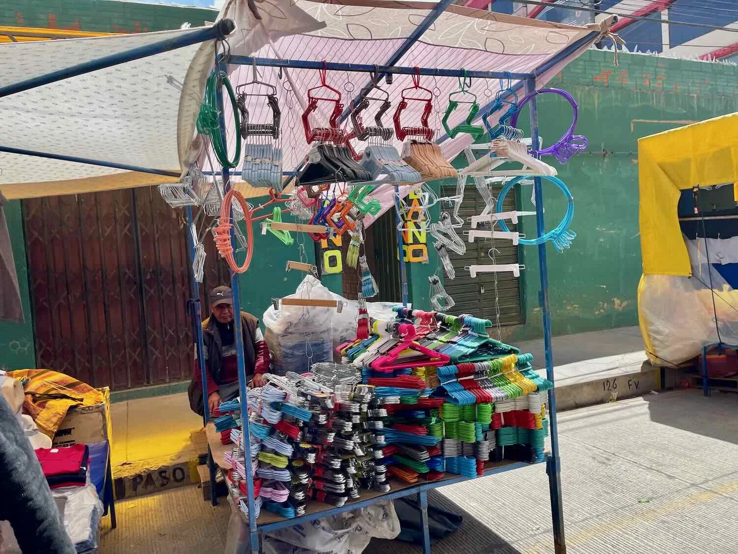 Some shops were extremely specialized. This guy only sold hangers.