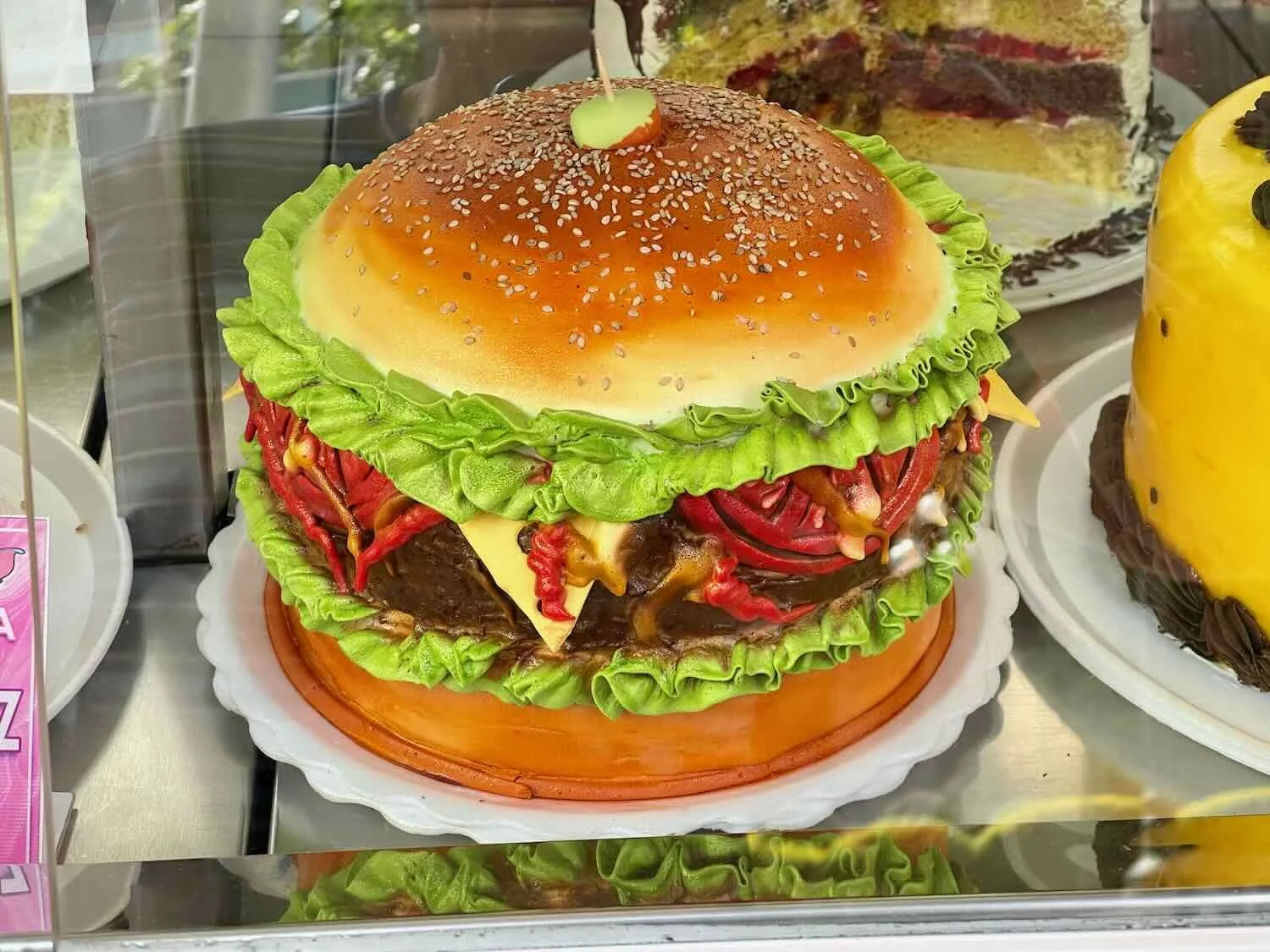 This birthday cake was dressed up as a hamburger.