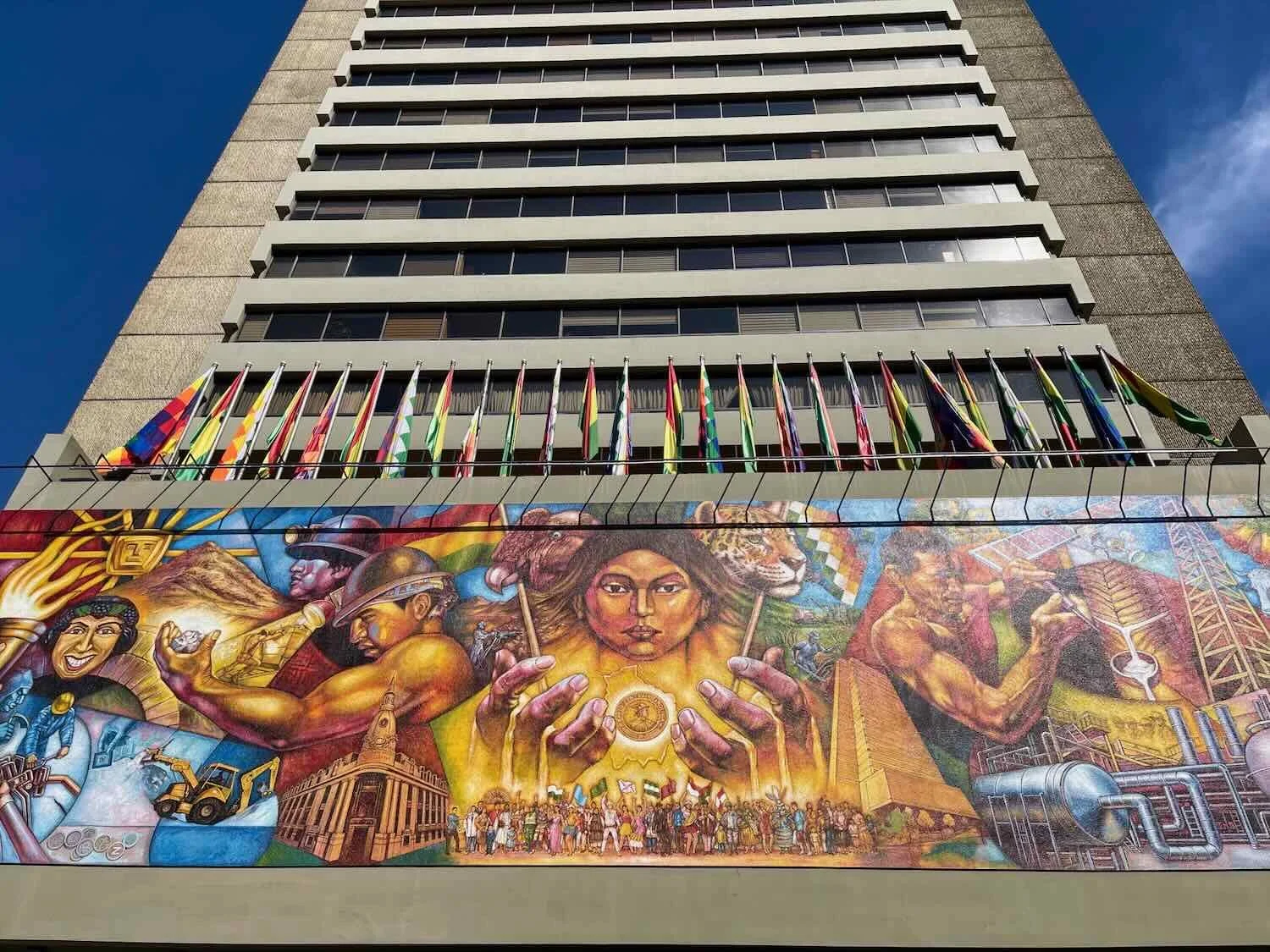 Modernist art and architecture of the Central Bank of Bolivia contrasted with the surrounding, neoclassical buildings.