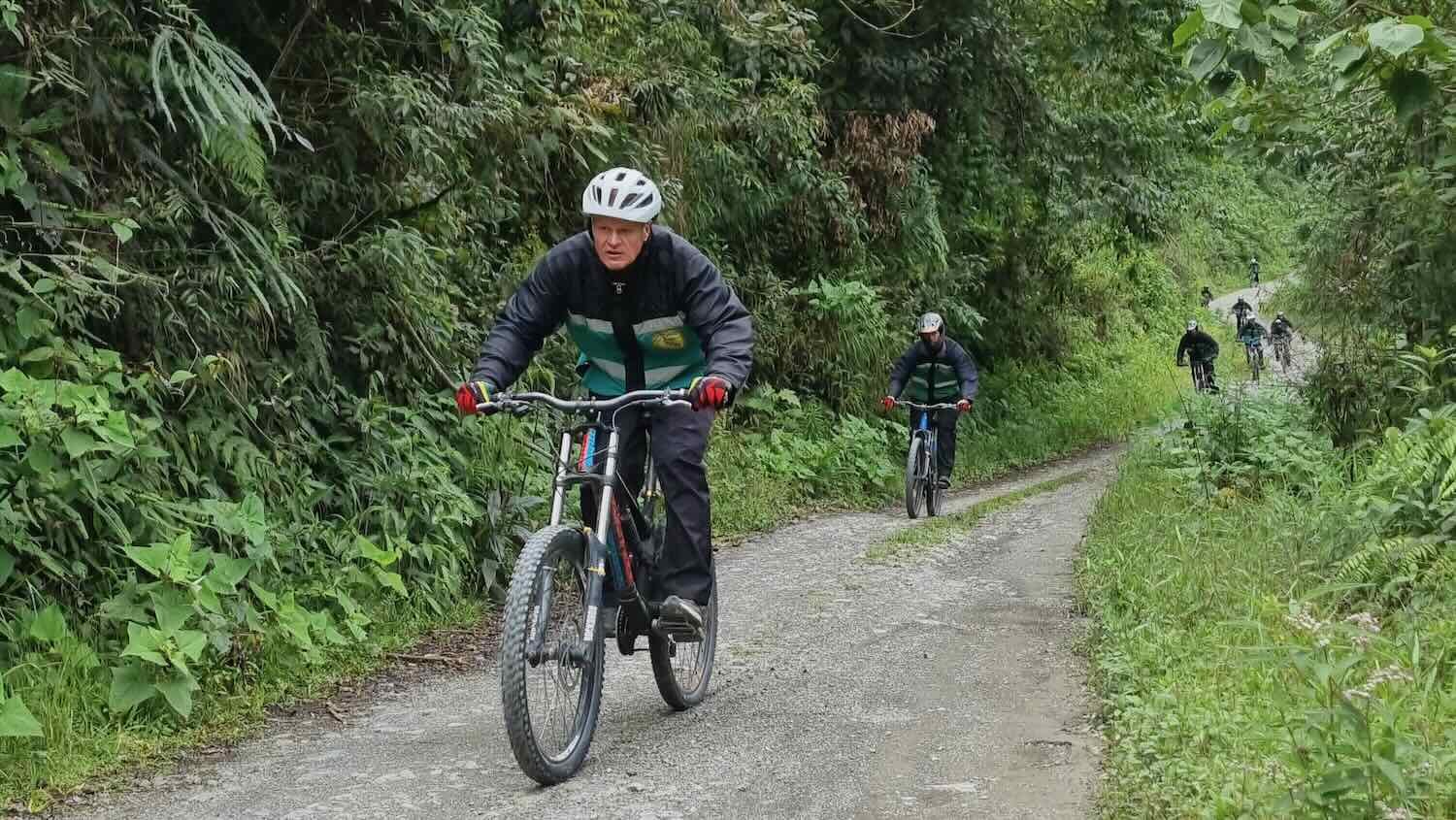 PedalingGuy charging down the mountain surrounded by Yungas jungle.