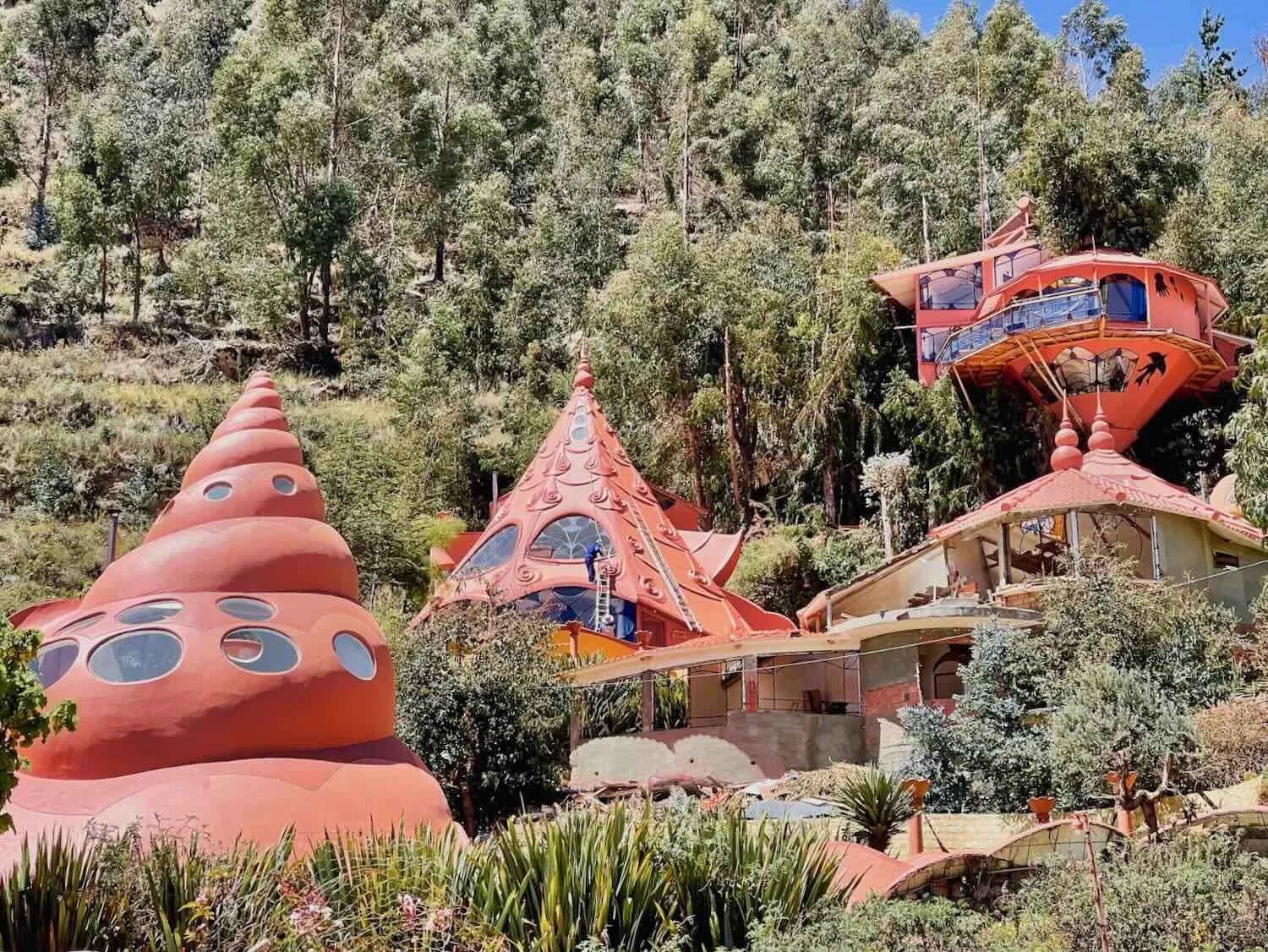 The whimsical turrets of the Hostal Las Olas studded the side of a hill, overlooking the town.