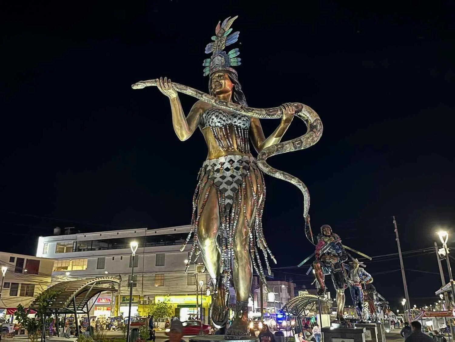 Statue of a Carnival Snake Charmer