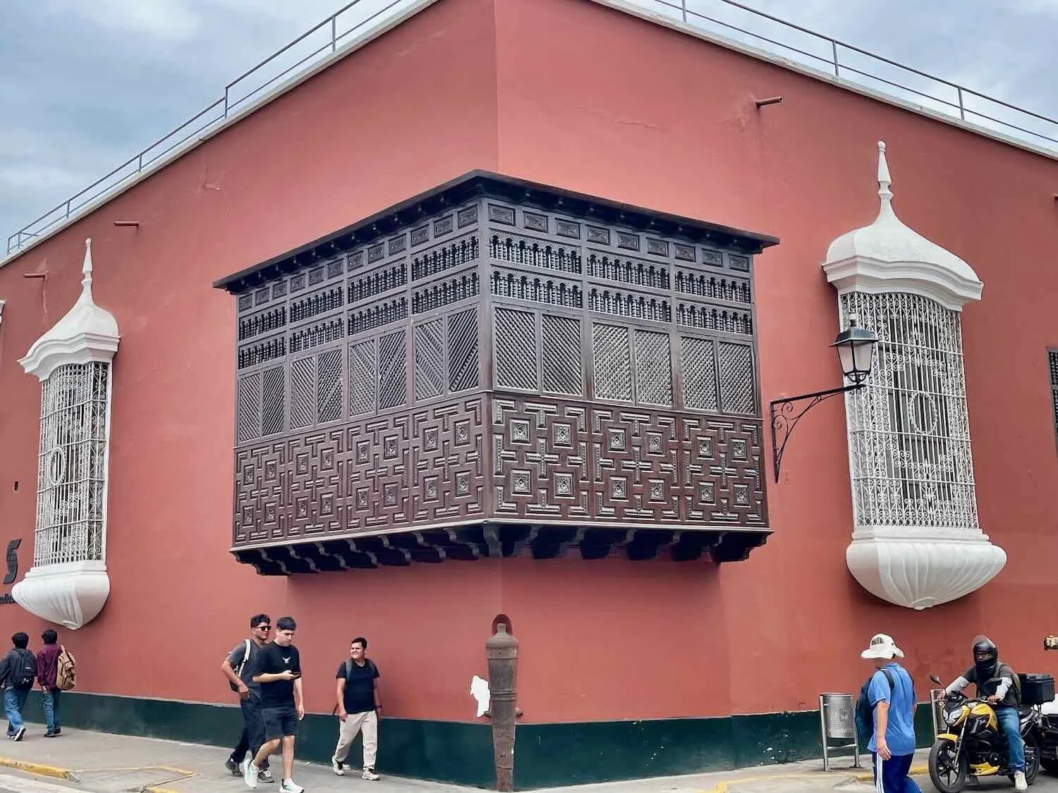 A traditional, wooden balcony near the Plaza de Armas
