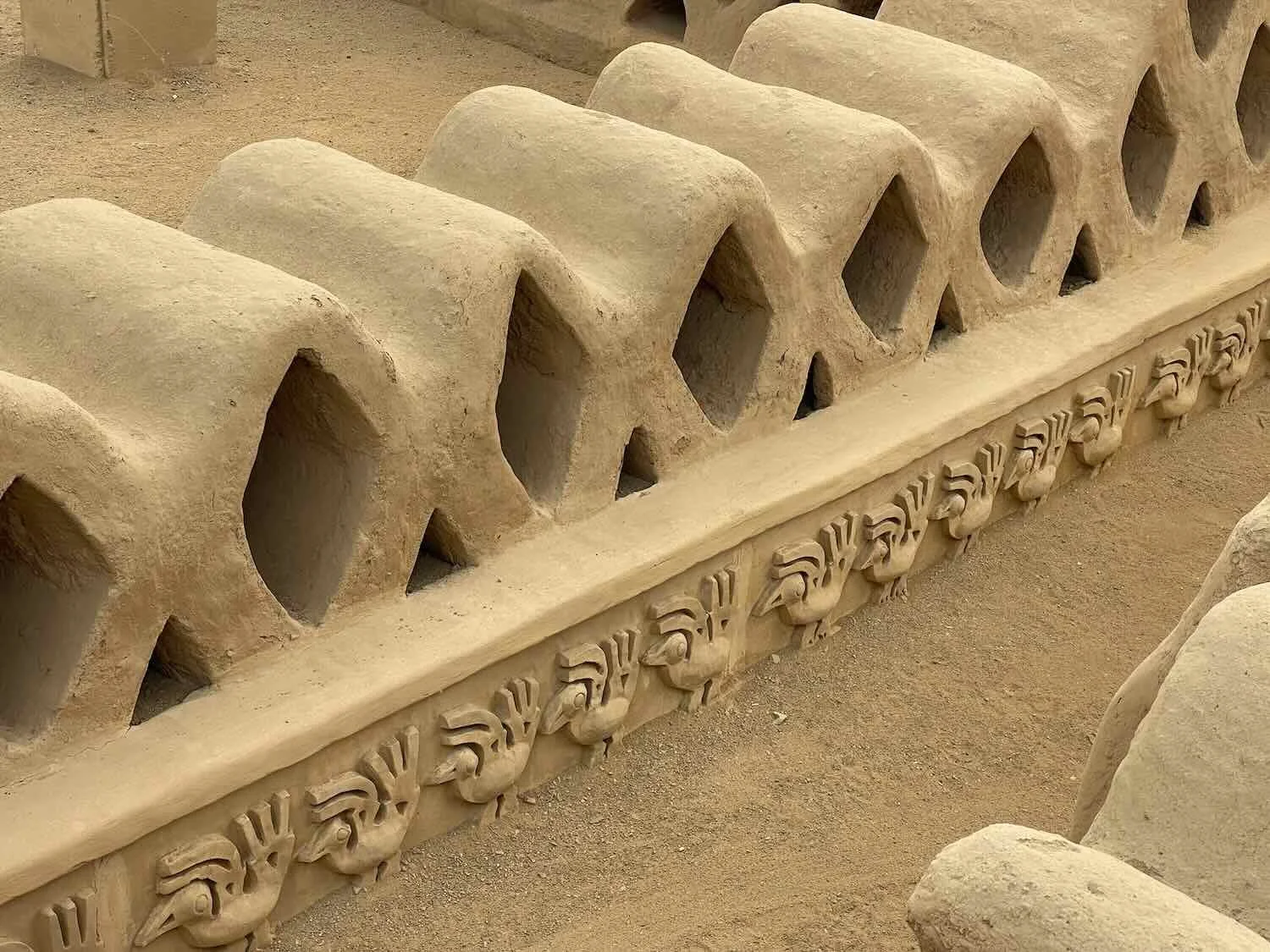 Wall detail with fishnet and seabird motifs, Chan Chan Archaeological Site