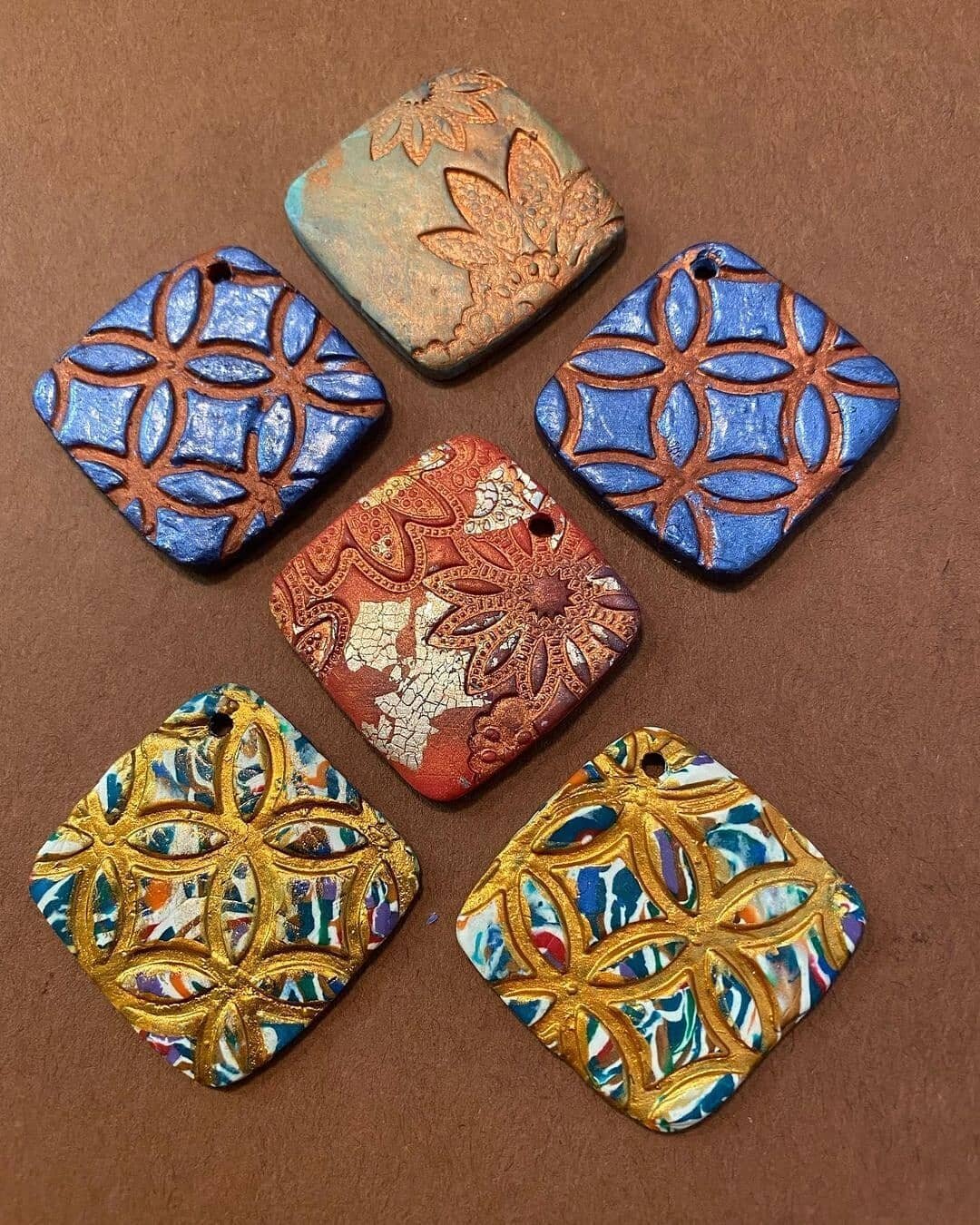 Sara Stover has been working on making polymer pendants and sculptures over the past year and a half. We can't wait to reopen our gallery to share some of her beautiful art with the world. 💥
.
.
.
.
.
.
.
.
.
.
 #polymer #clay #pendants #jewlerymaki