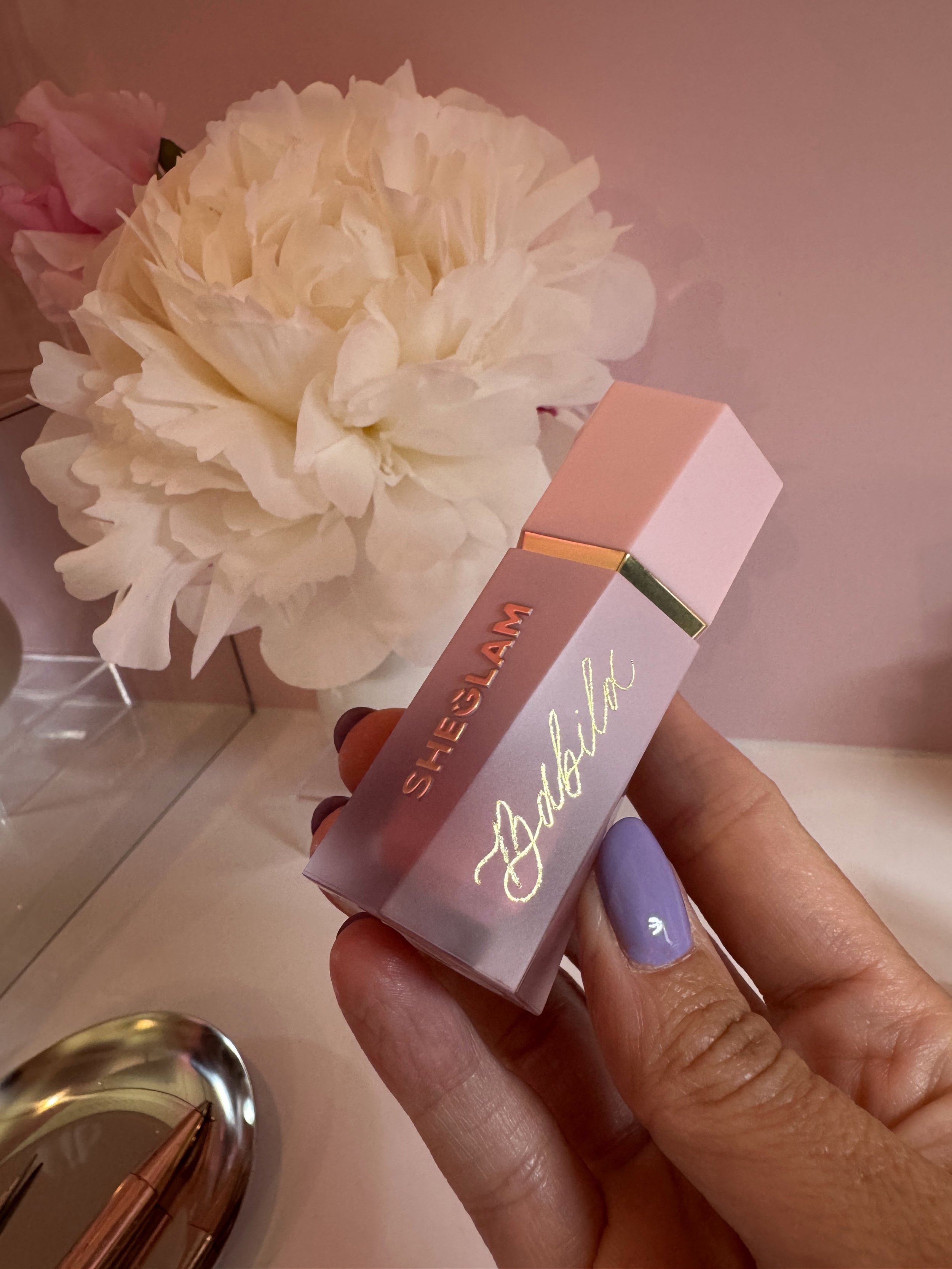 Live calligraphy hot foiling personalisation for beauty brand activation
