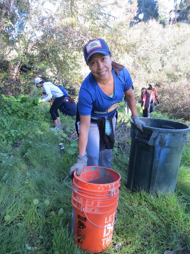 Volunteer with buckets 2.JPG