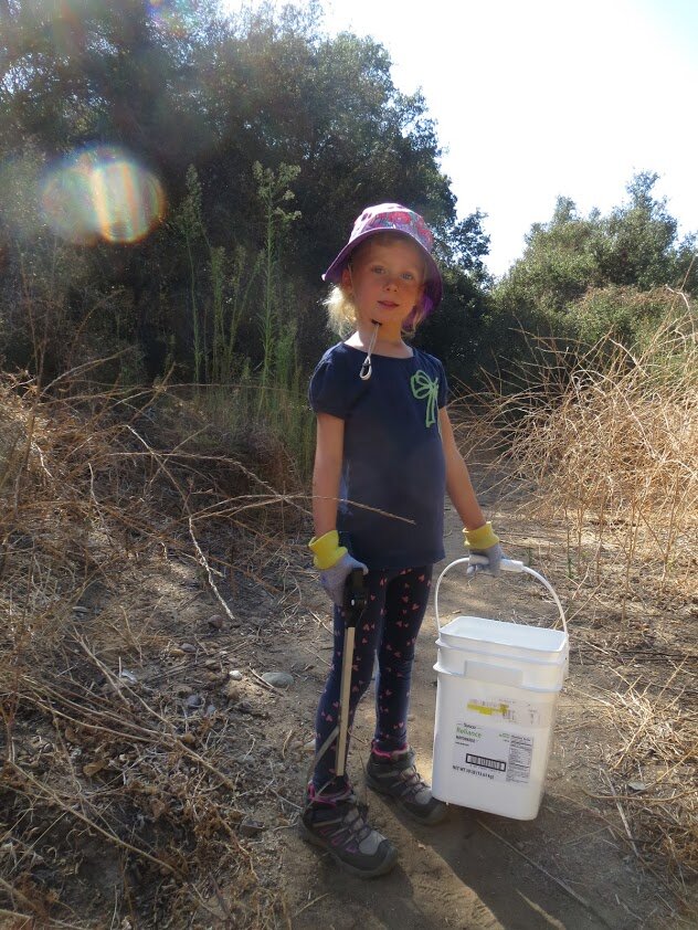 youth volunteer with bucket