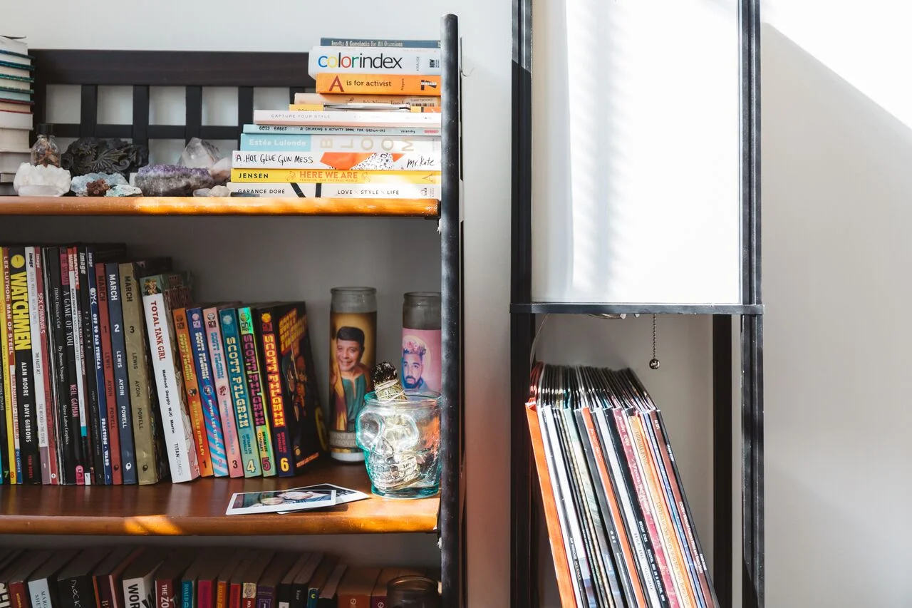 Books, crystals and a vinyl collection in the couple’s living room.