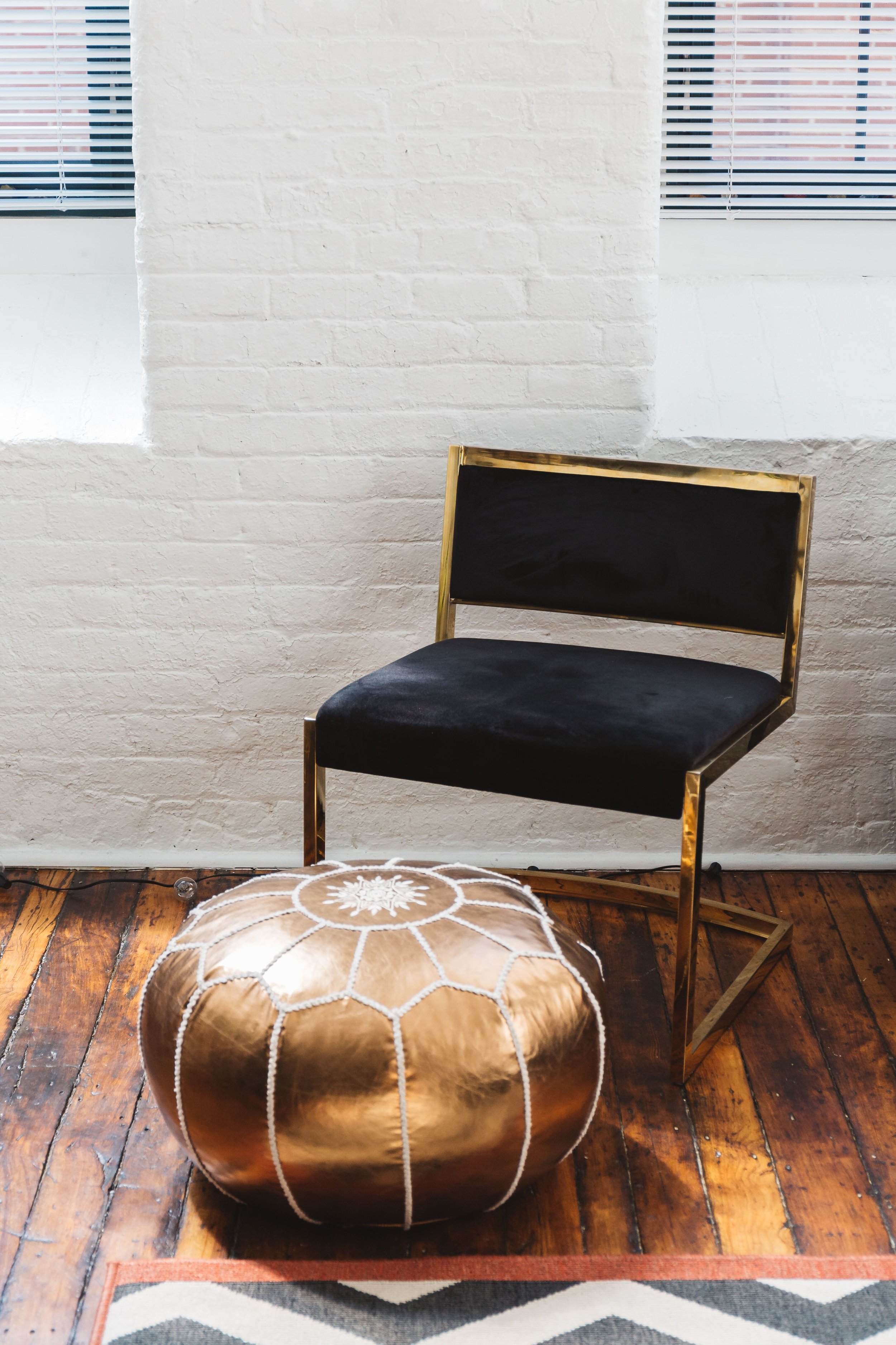 Bright copper poof found at HomeGoods and the chair was purchased from a neighbor.