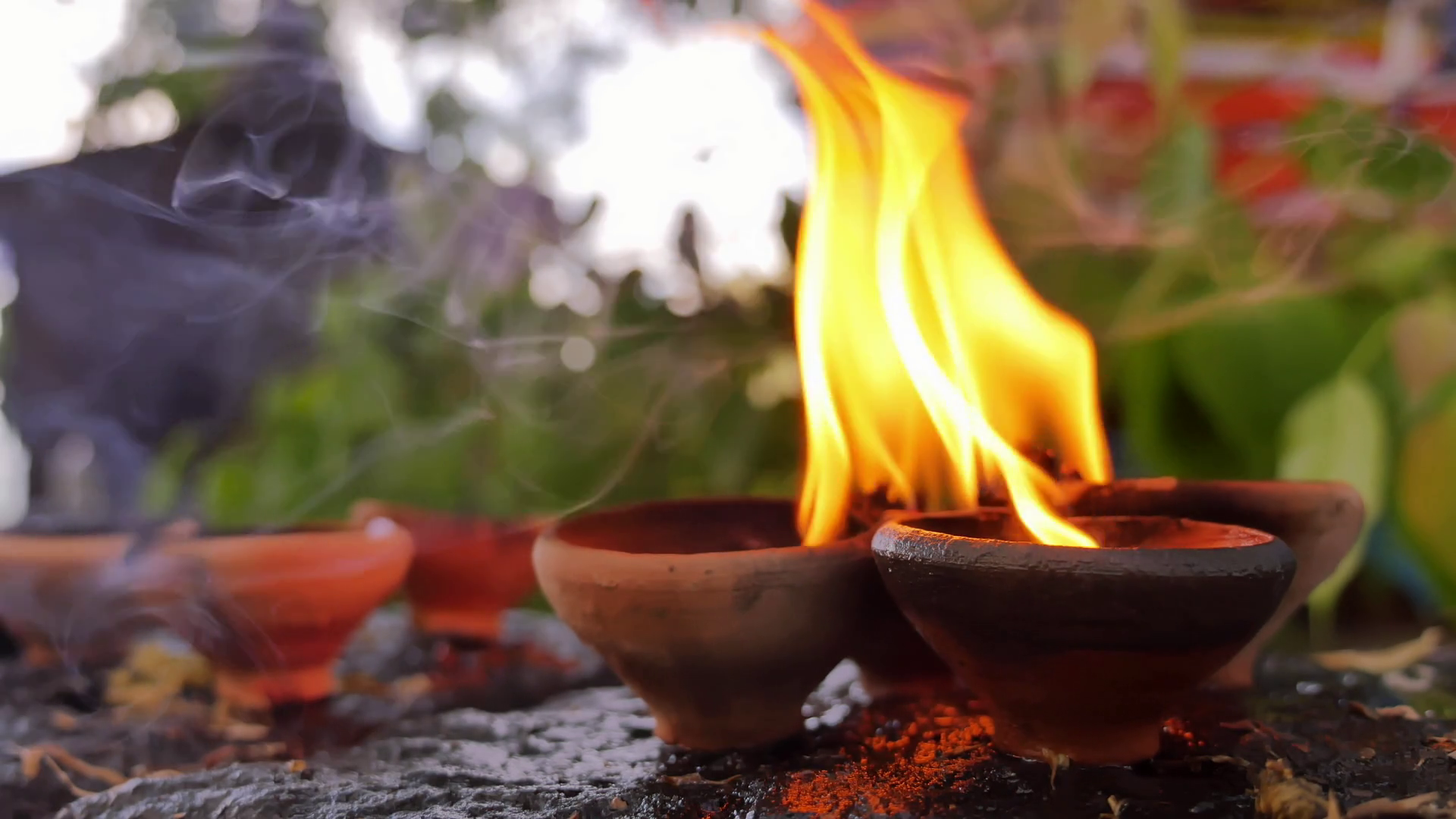 videoblocks-spiritual-background-of-burning-candles-in-buddhist-temple-flames-and-fumes-of-aromatic-oil-in-south-east-asia_sglbrk5nx_thumbnail-full08.png